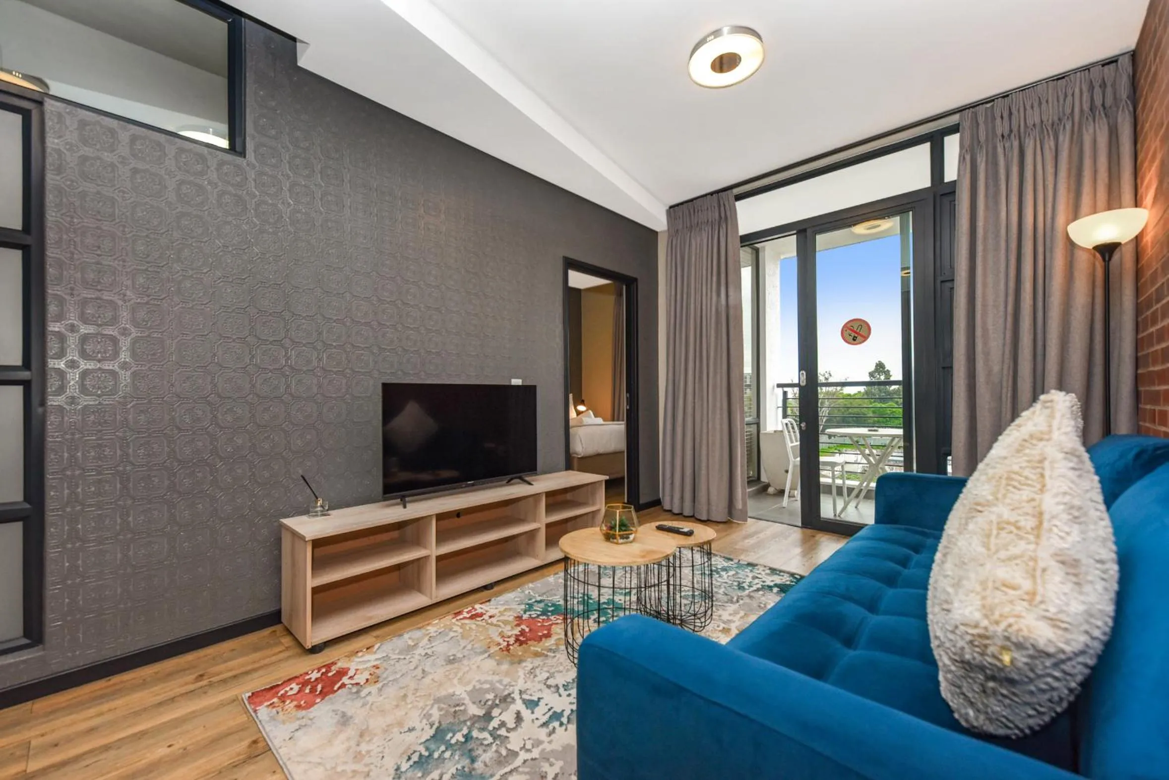Communal lounge/ TV room in Easy Stay - The Vantage Rosebank