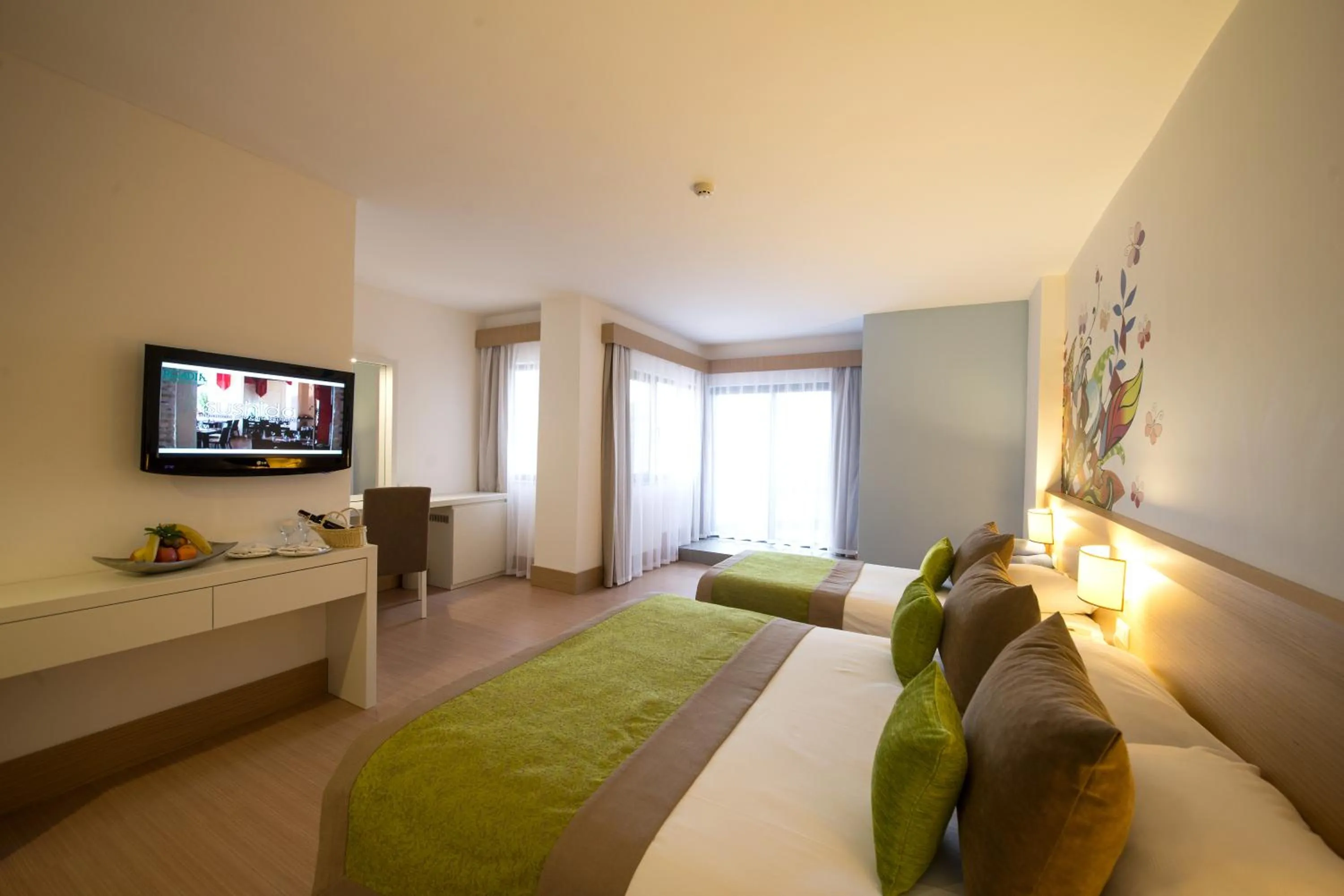 Seating area, Bed in Limak Arcadia Golf Resort - 2 children Free up to age 14