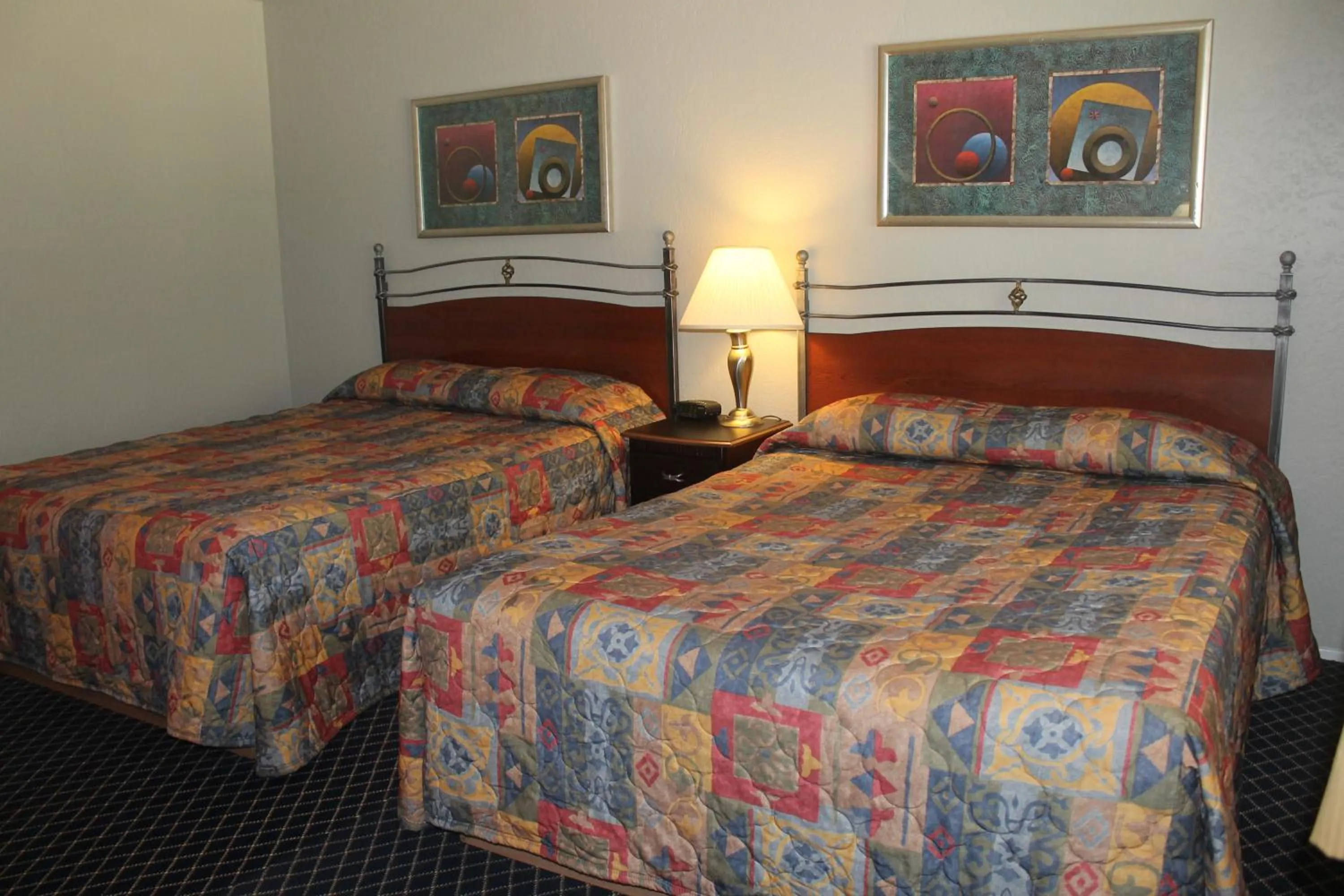 Bed in Golden Chain Motel