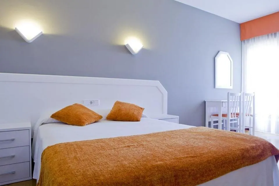 Bed in Hotel Los Naranjos