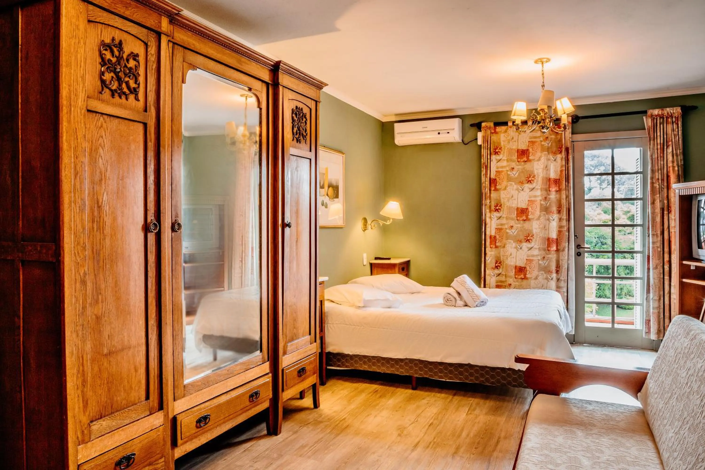 Bed in Pousada Casa Rosa