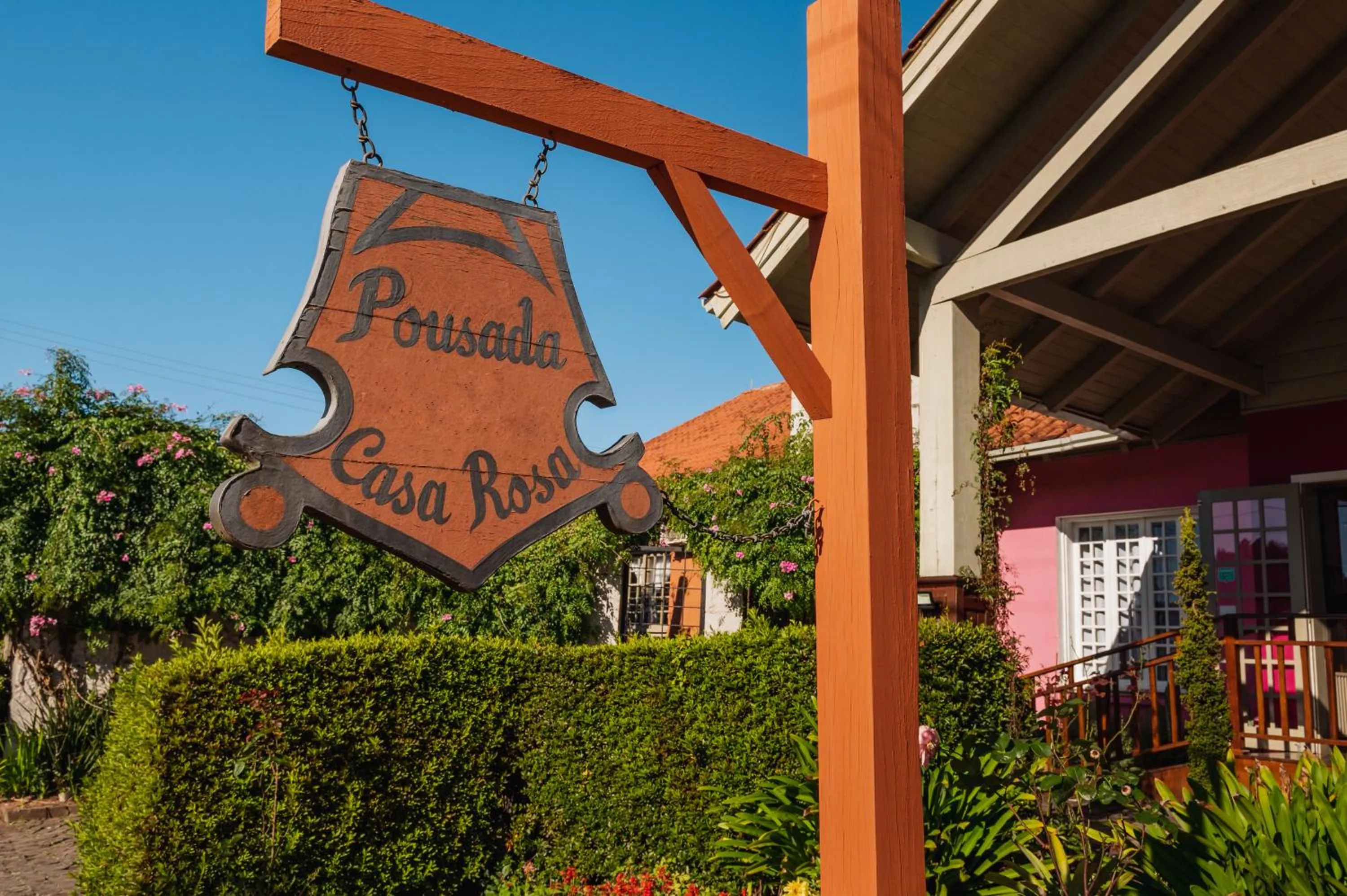 Logo/Certificate/Sign in Pousada Casa Rosa