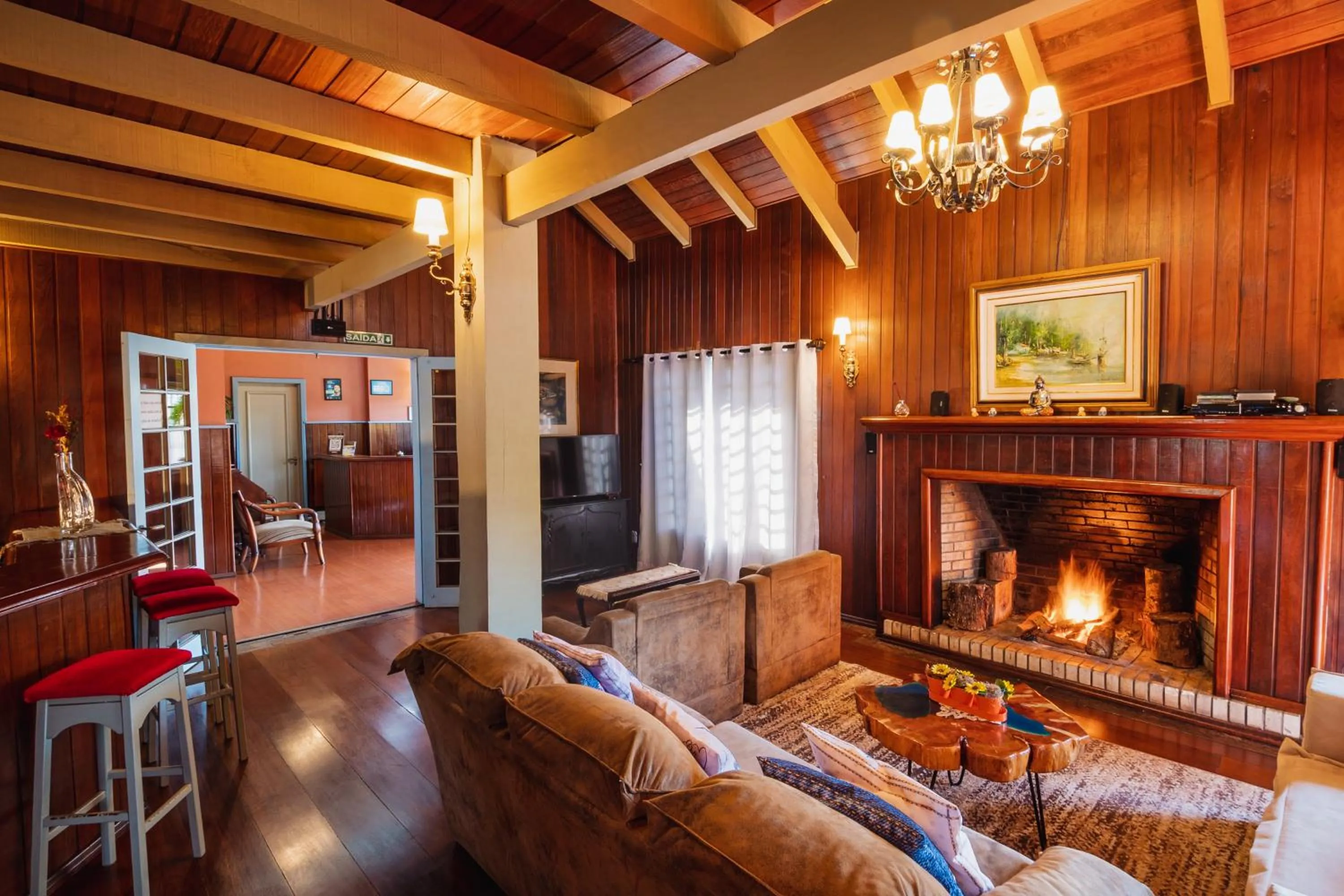 Living room in Pousada Casa Rosa