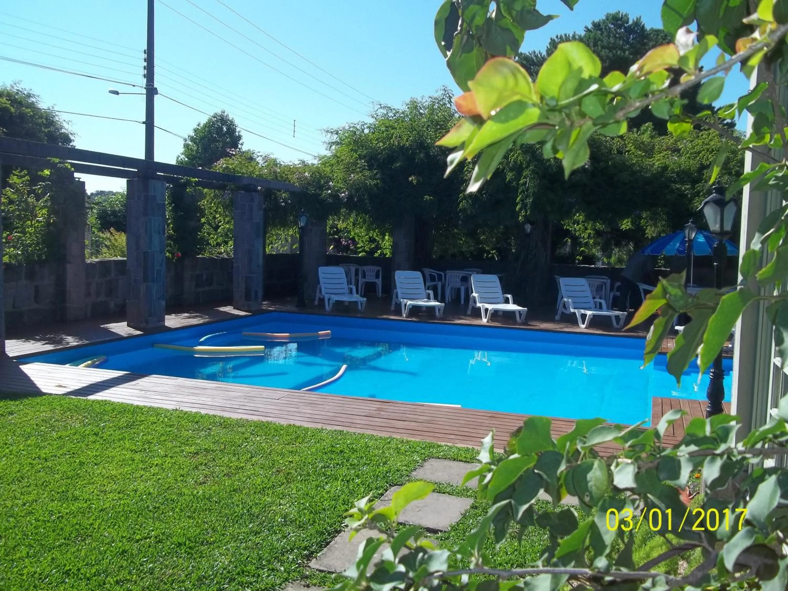 Swimming pool in Pousada Casa Rosa