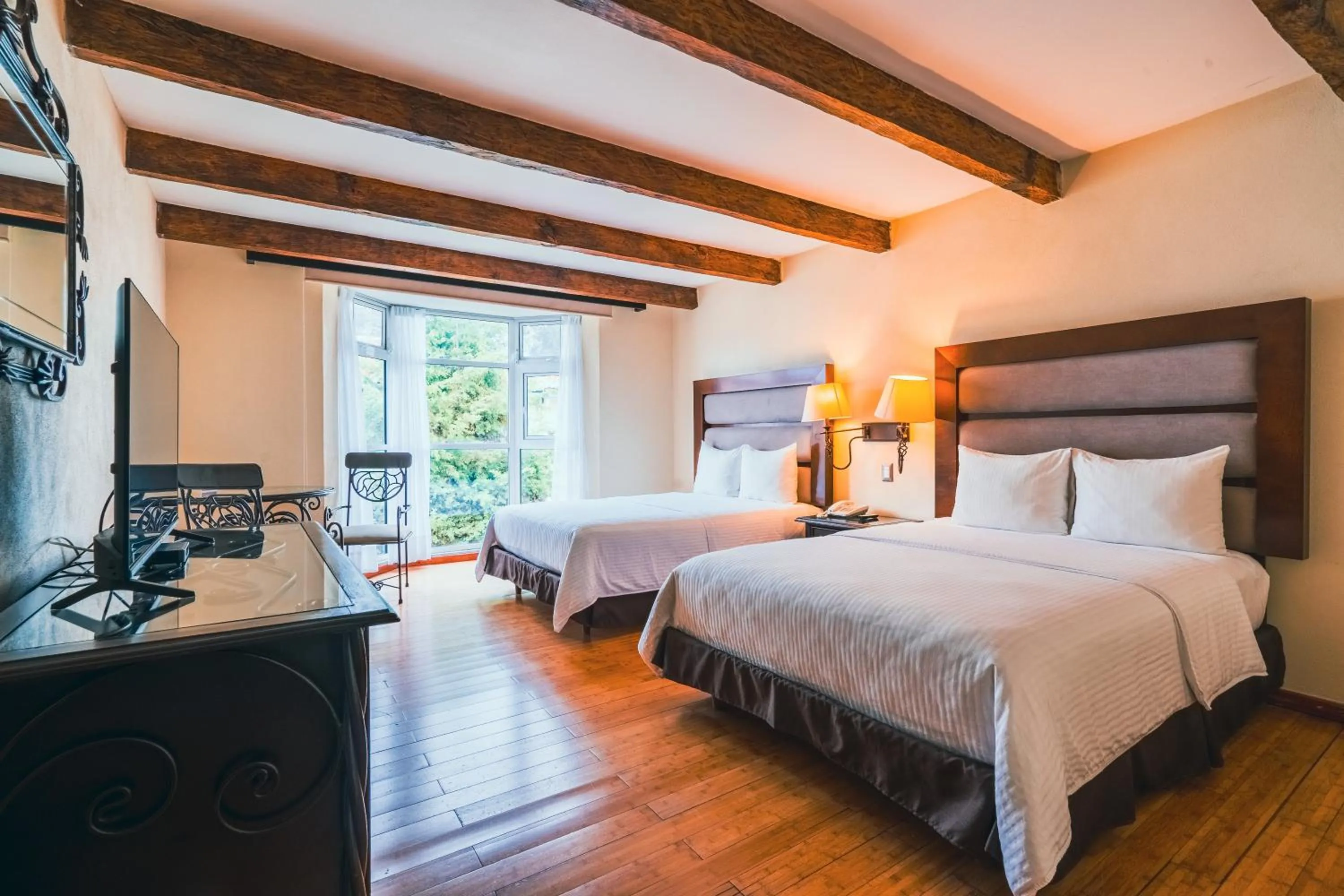 Photo of the whole room, Bed in Hotel Villa Mercedes San Cristobal