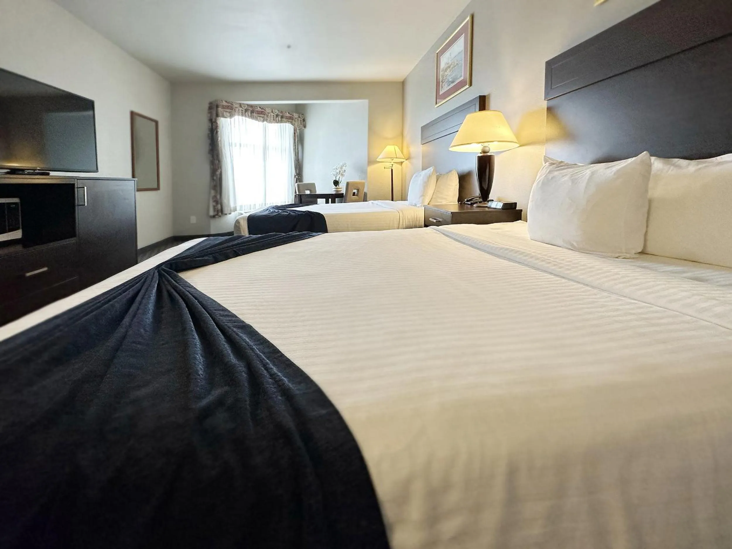 Bed in BayVue Hotel, Resort & Suites