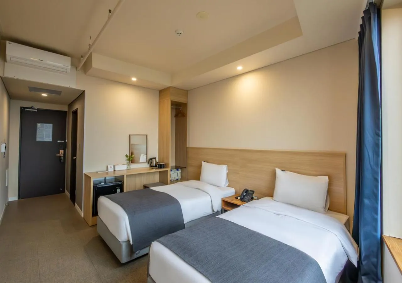 Bedroom, Bed in JK Blossom Hotel