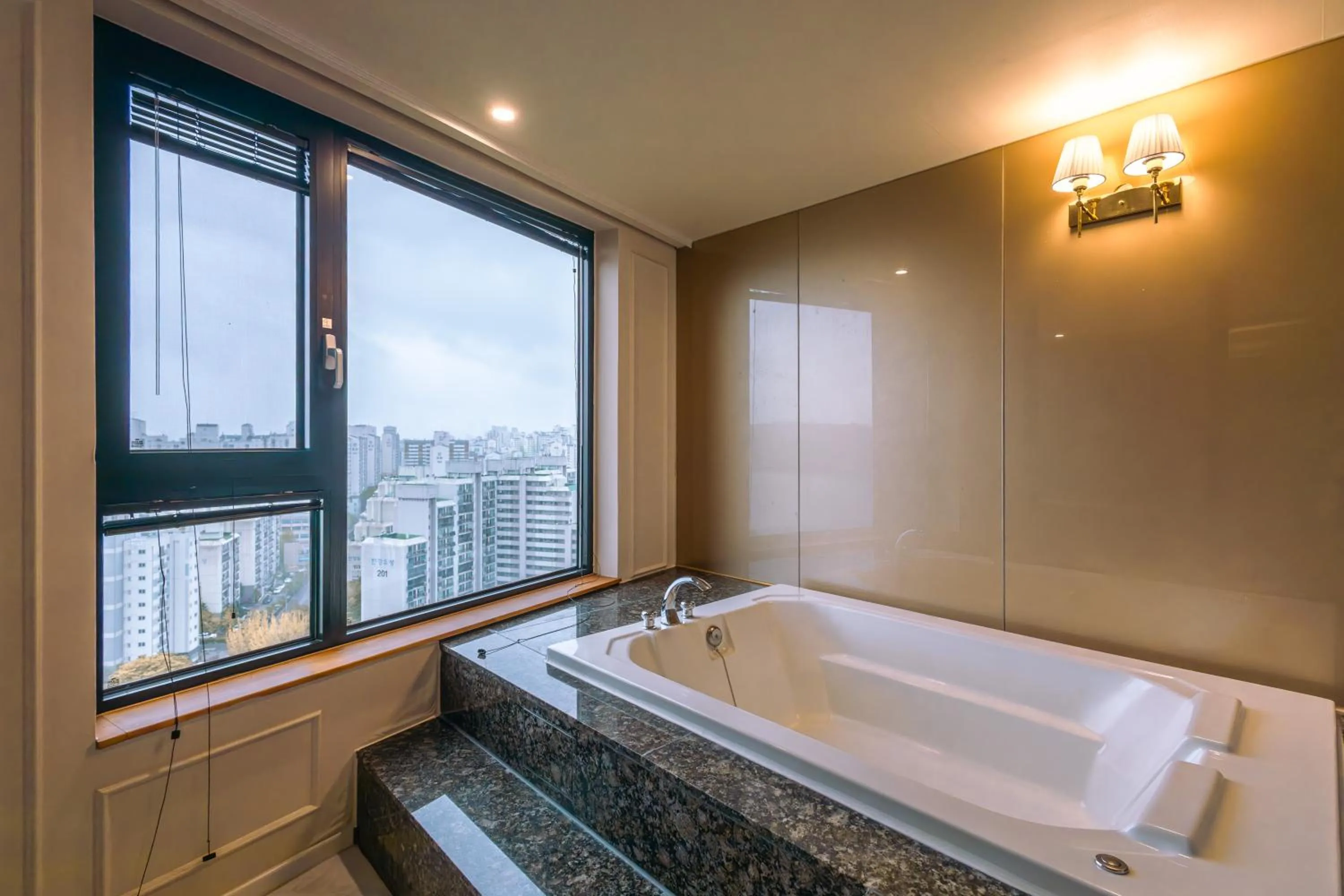 Bath in JK Blossom Hotel