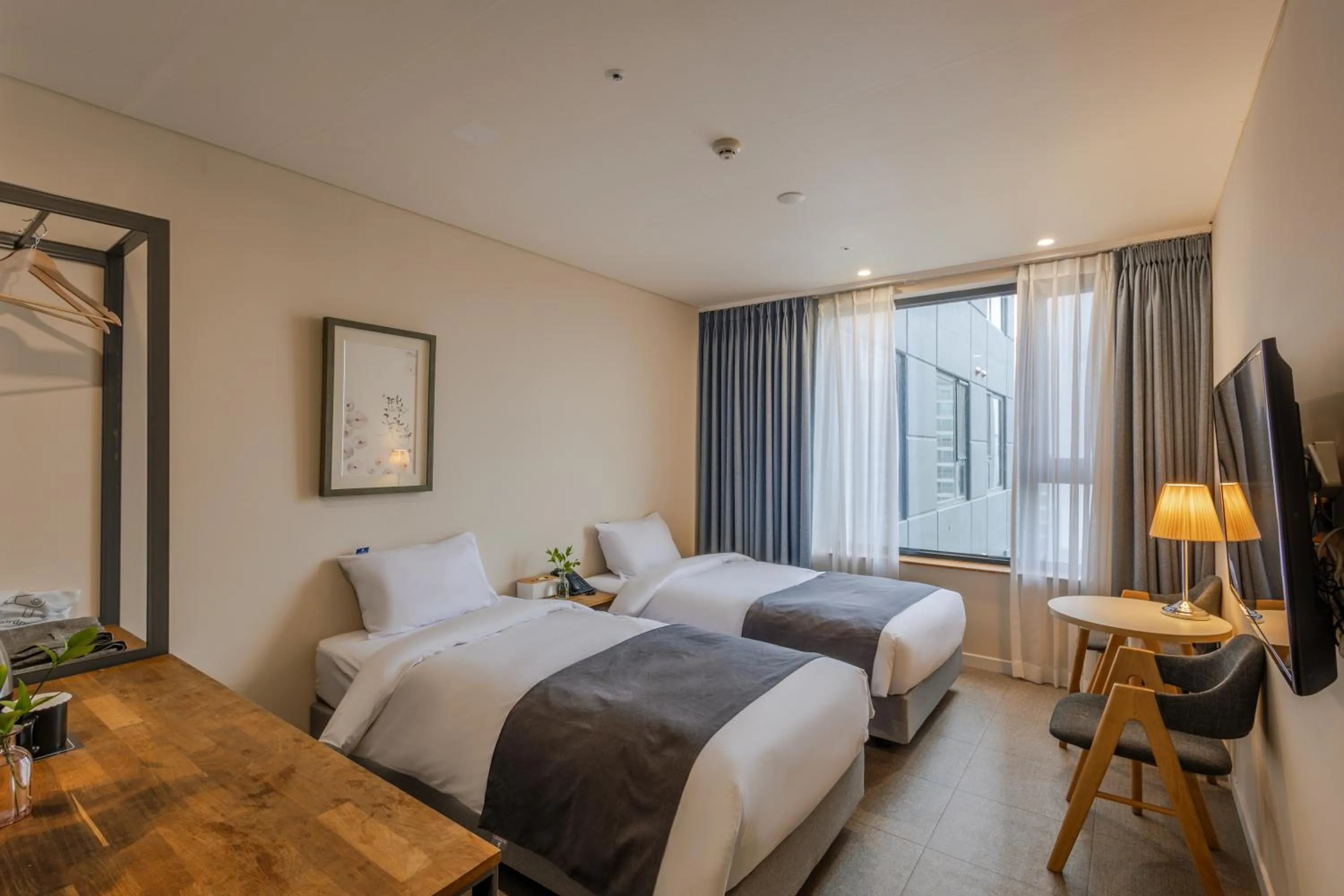 Bedroom, Bed in JK Blossom Hotel