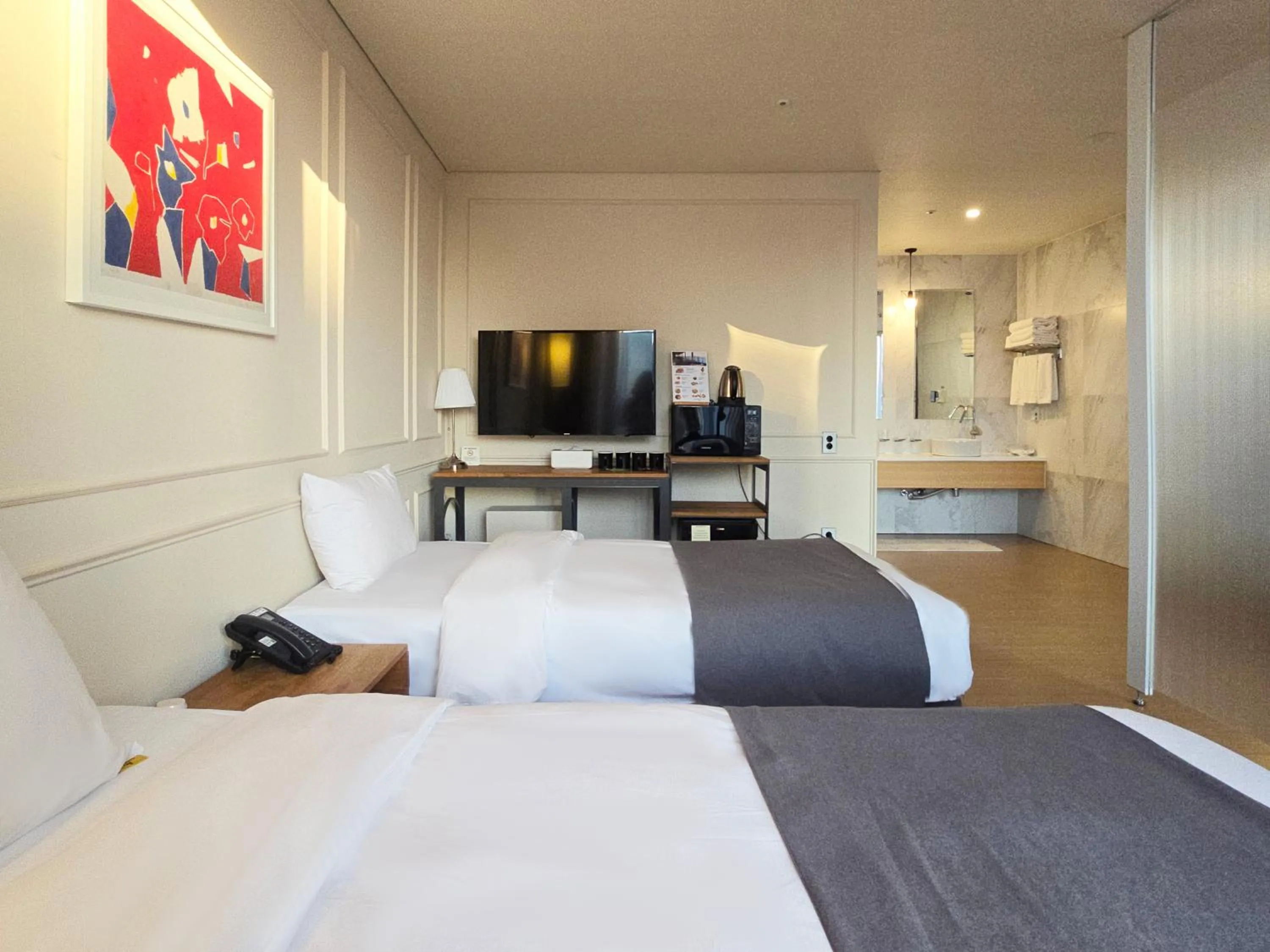 Bedroom, Bed in JK Blossom Hotel