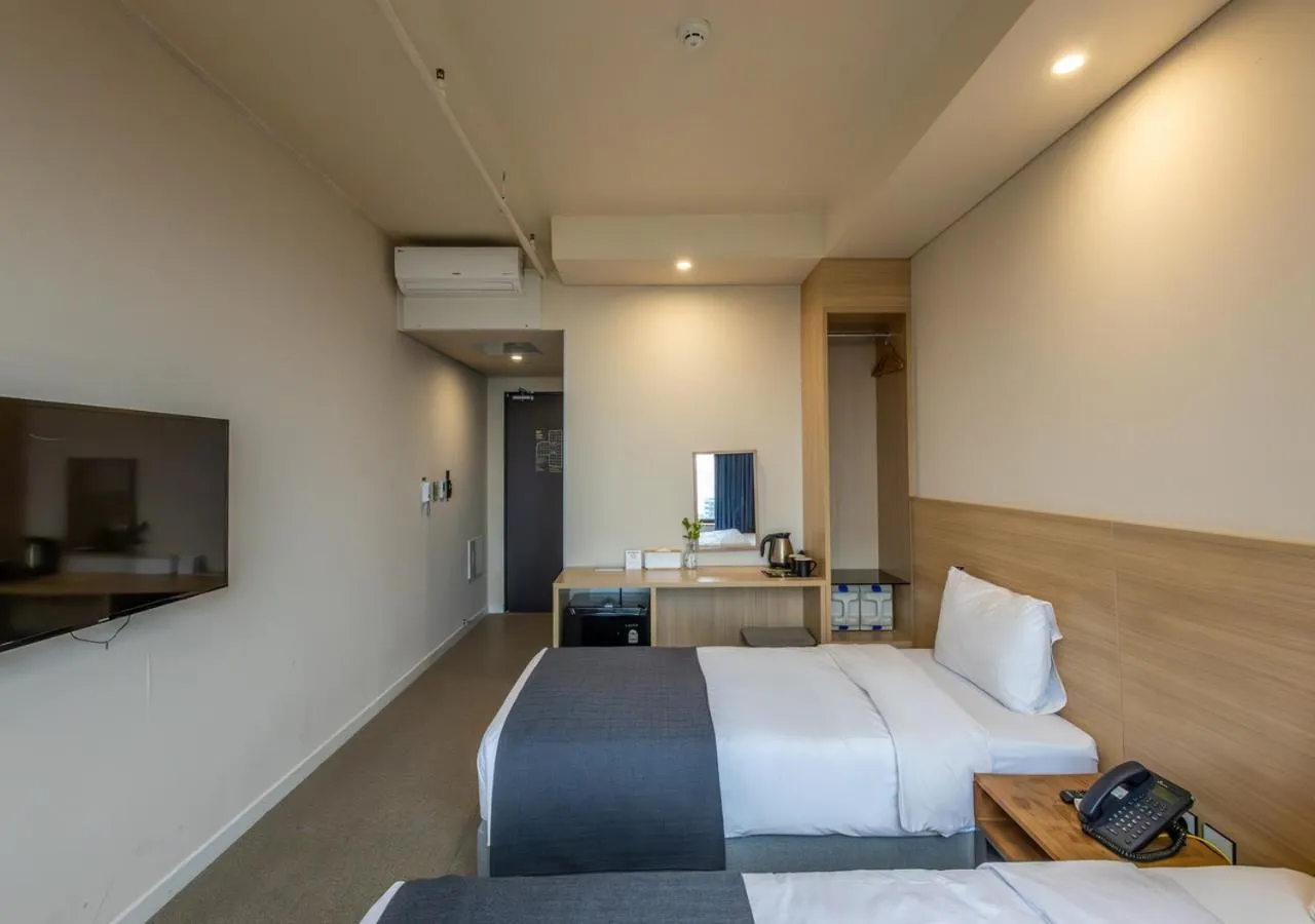 Bedroom, Bed in JK Blossom Hotel