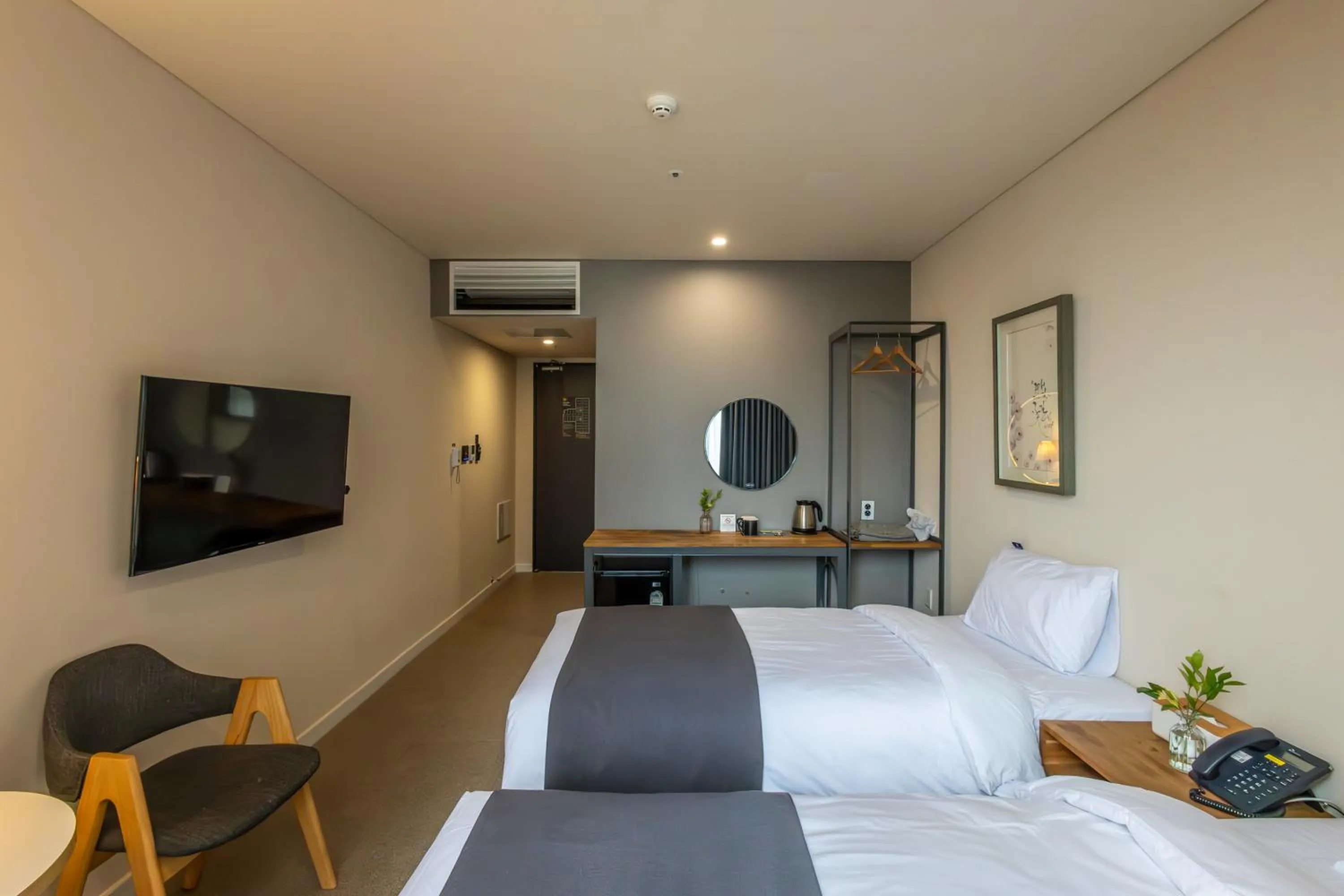 Bedroom, Bed in JK Blossom Hotel