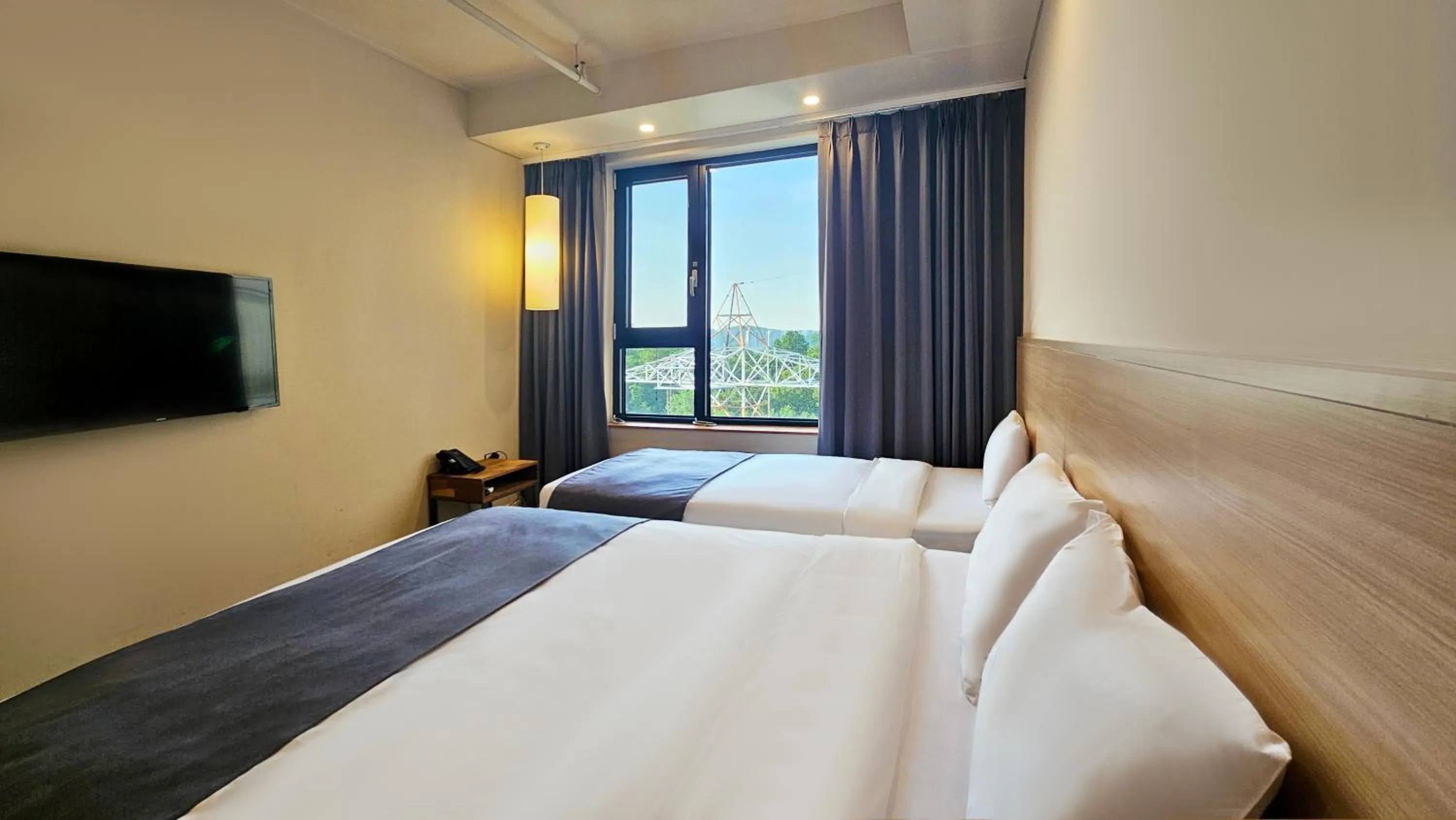 View (from property/room), Bed in JK Blossom Hotel