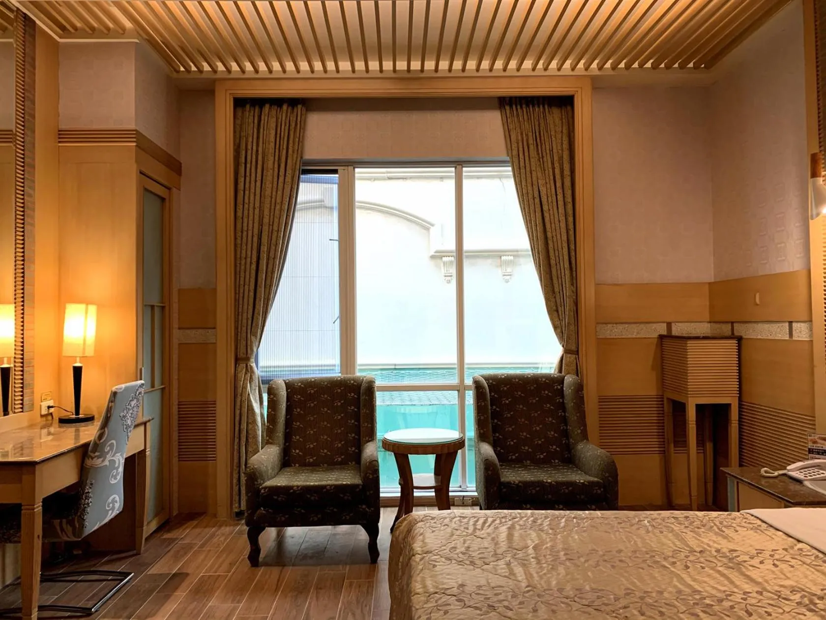 Photo of the whole room in 國妃鷹堡時尚健康館King & Princess Motel