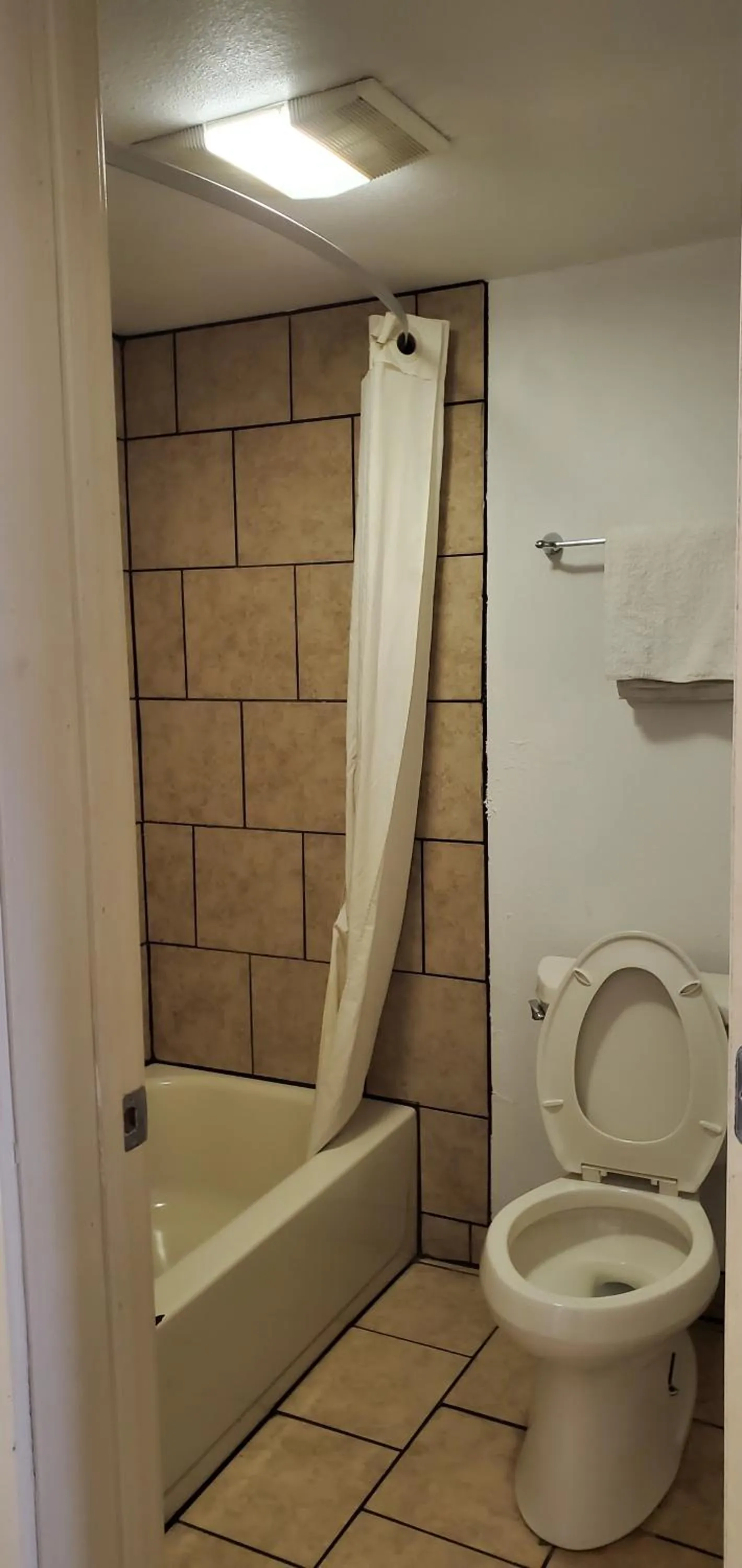 Toilet in Super 8 by Wyndham City of Moore