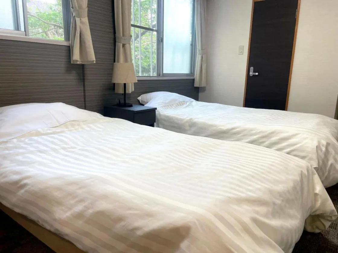 Bedroom, Bed in Itoen Hotel Inatori