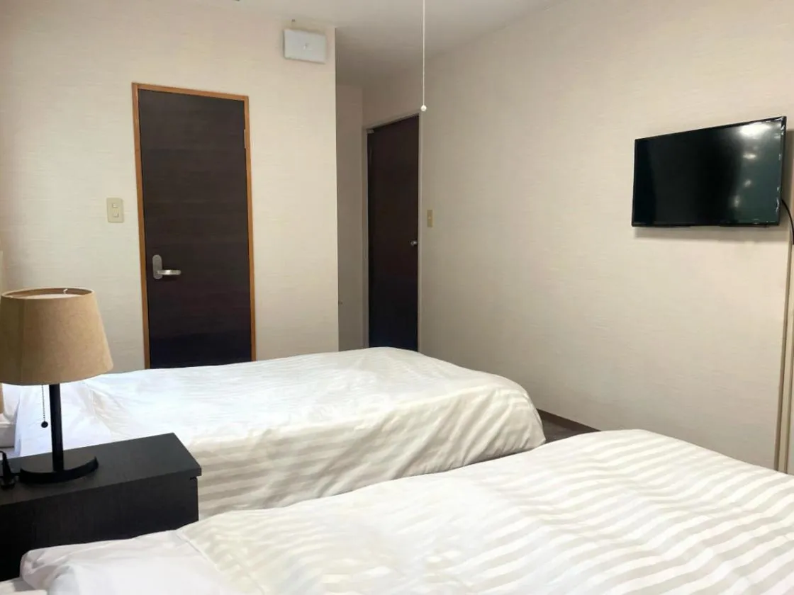 Bedroom, Bed in Itoen Hotel Inatori