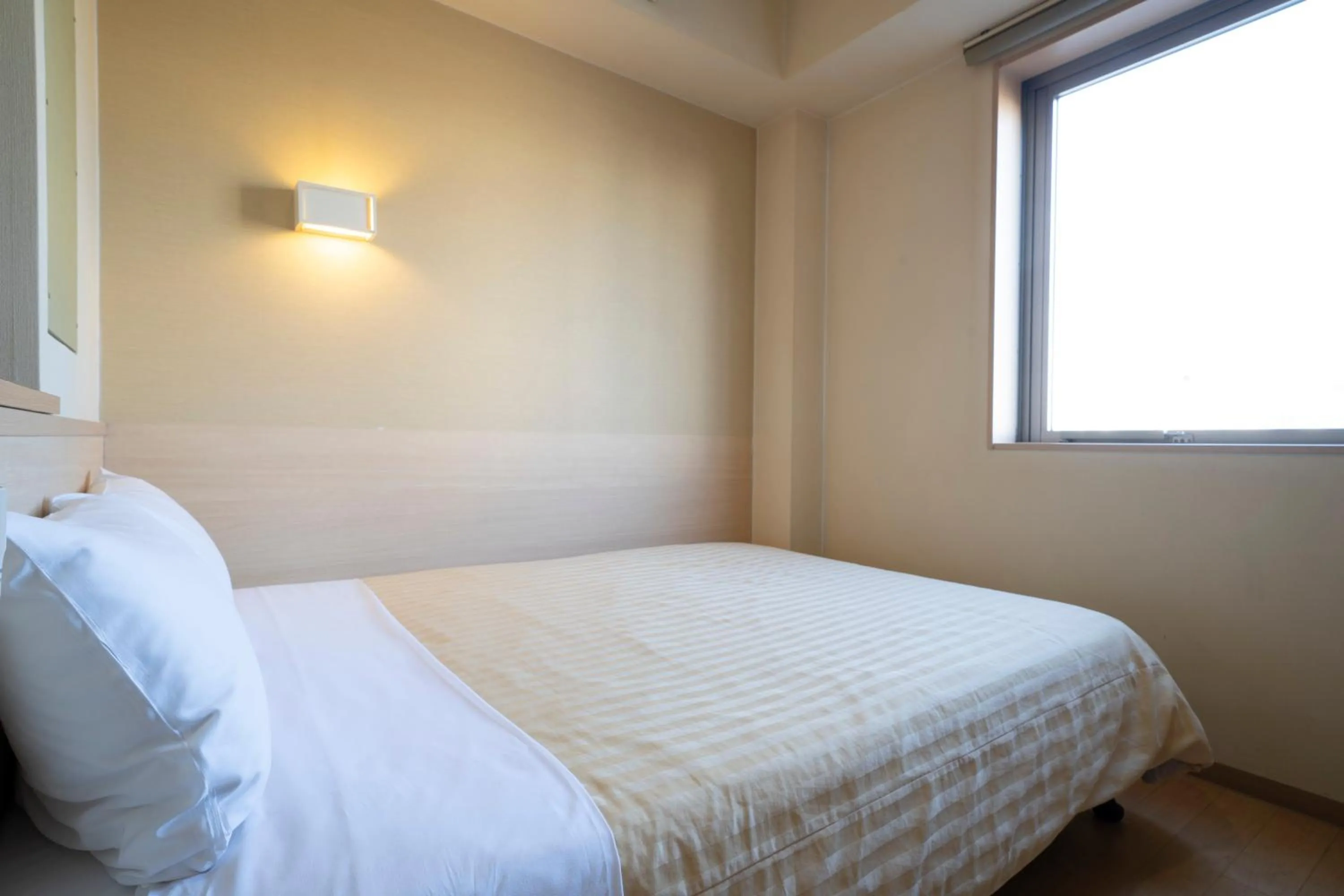 Bed in Hotel Monzennoyu