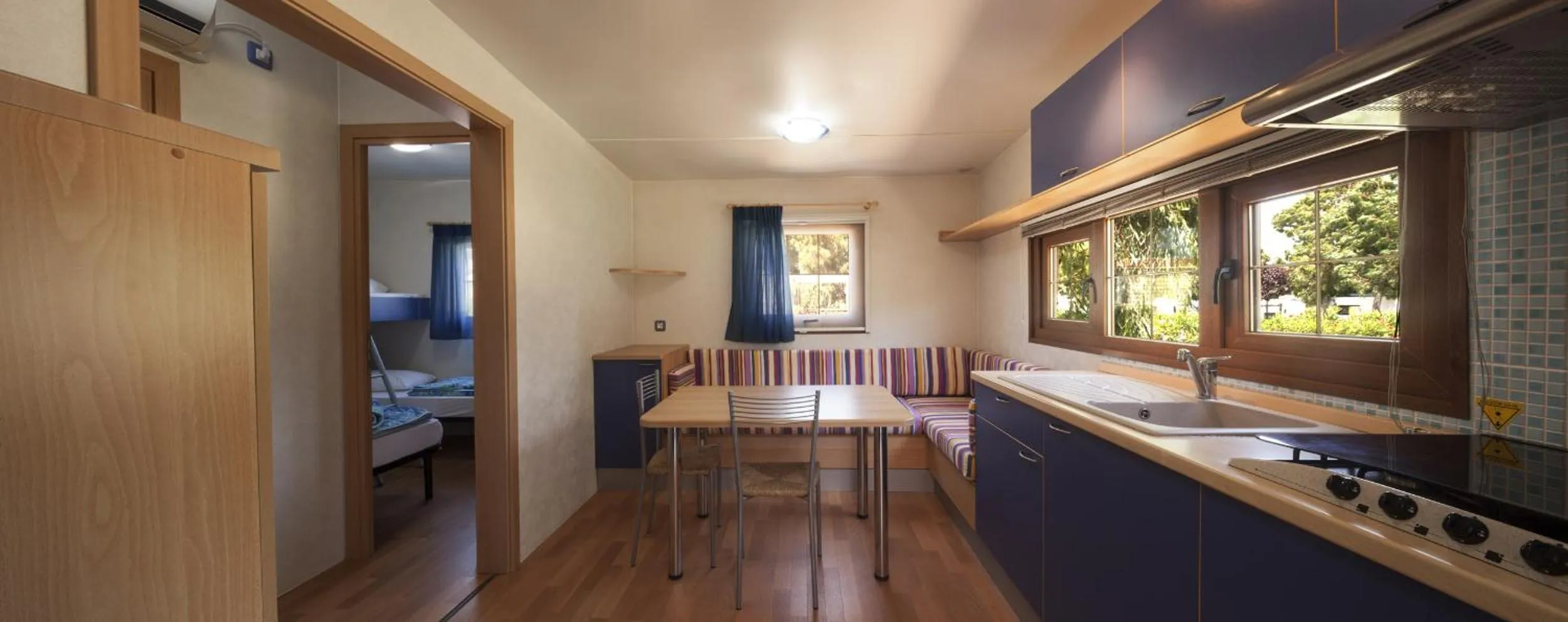 Kitchen or kitchenette in Camping Village Laguna Blu