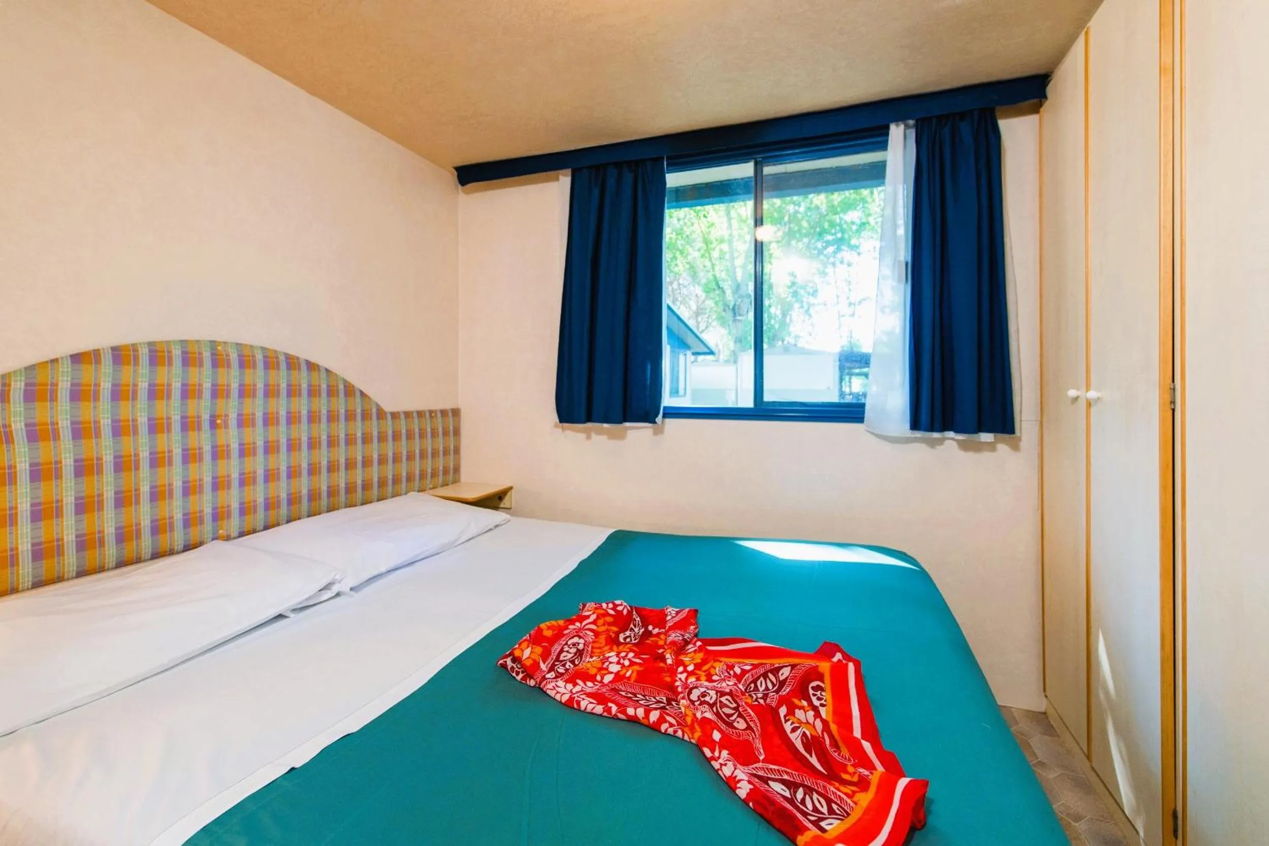 Bed in Camping Village Punta Navaccia