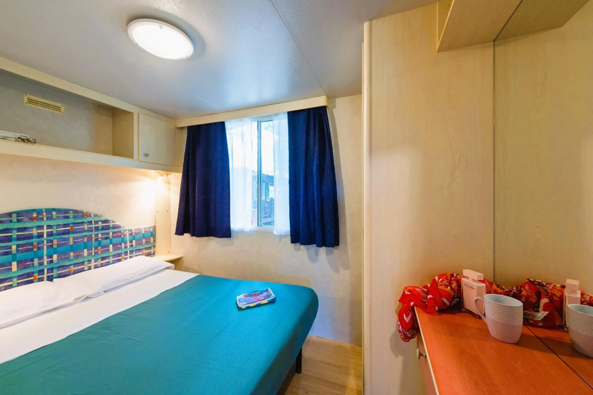 Bedroom, Bed in Camping Village Punta Navaccia