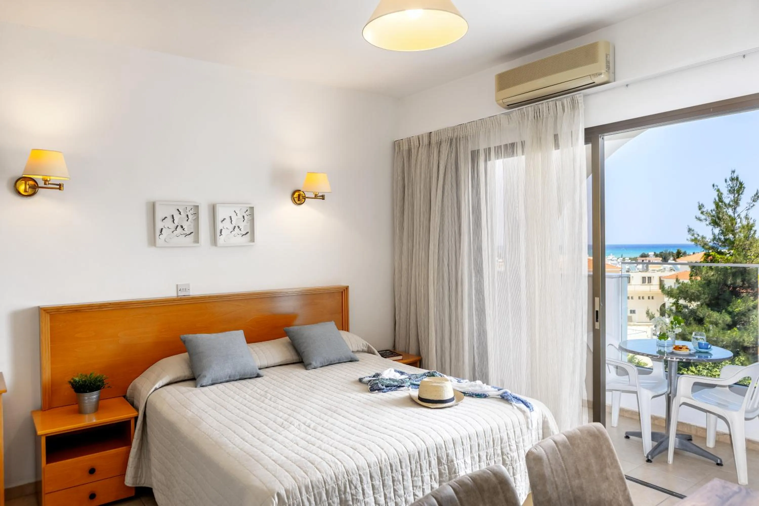 Bed in Stephanos Hotel Apartments