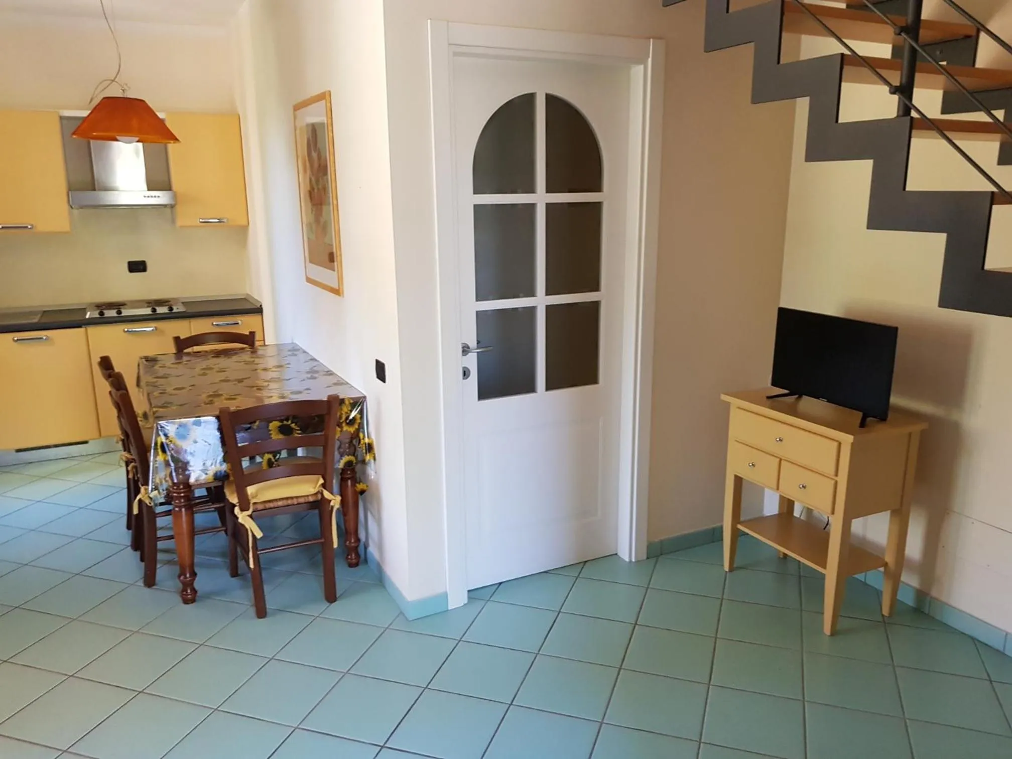 Communal lounge/ TV room in Villaggio Turistico Airone