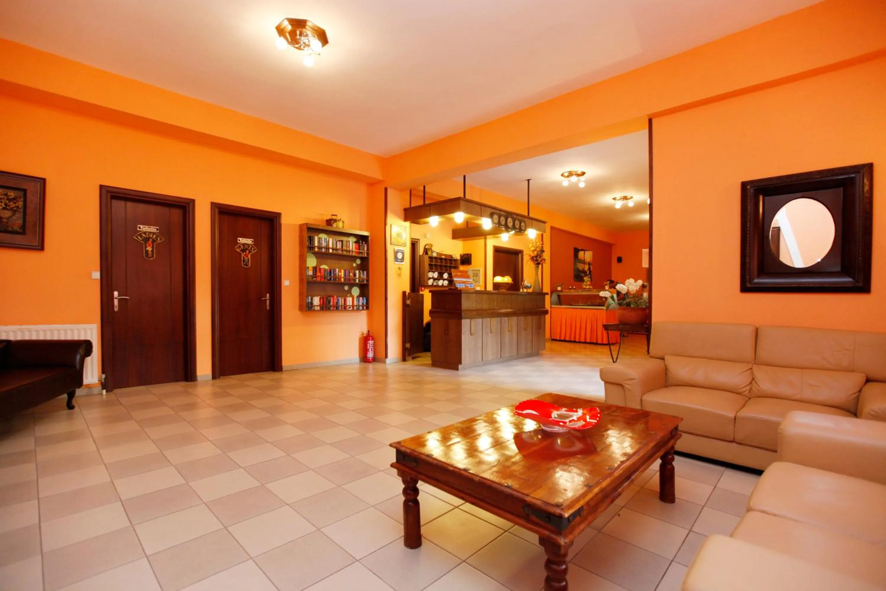 Communal lounge/ TV room in Ariadni Hotel Bungalows