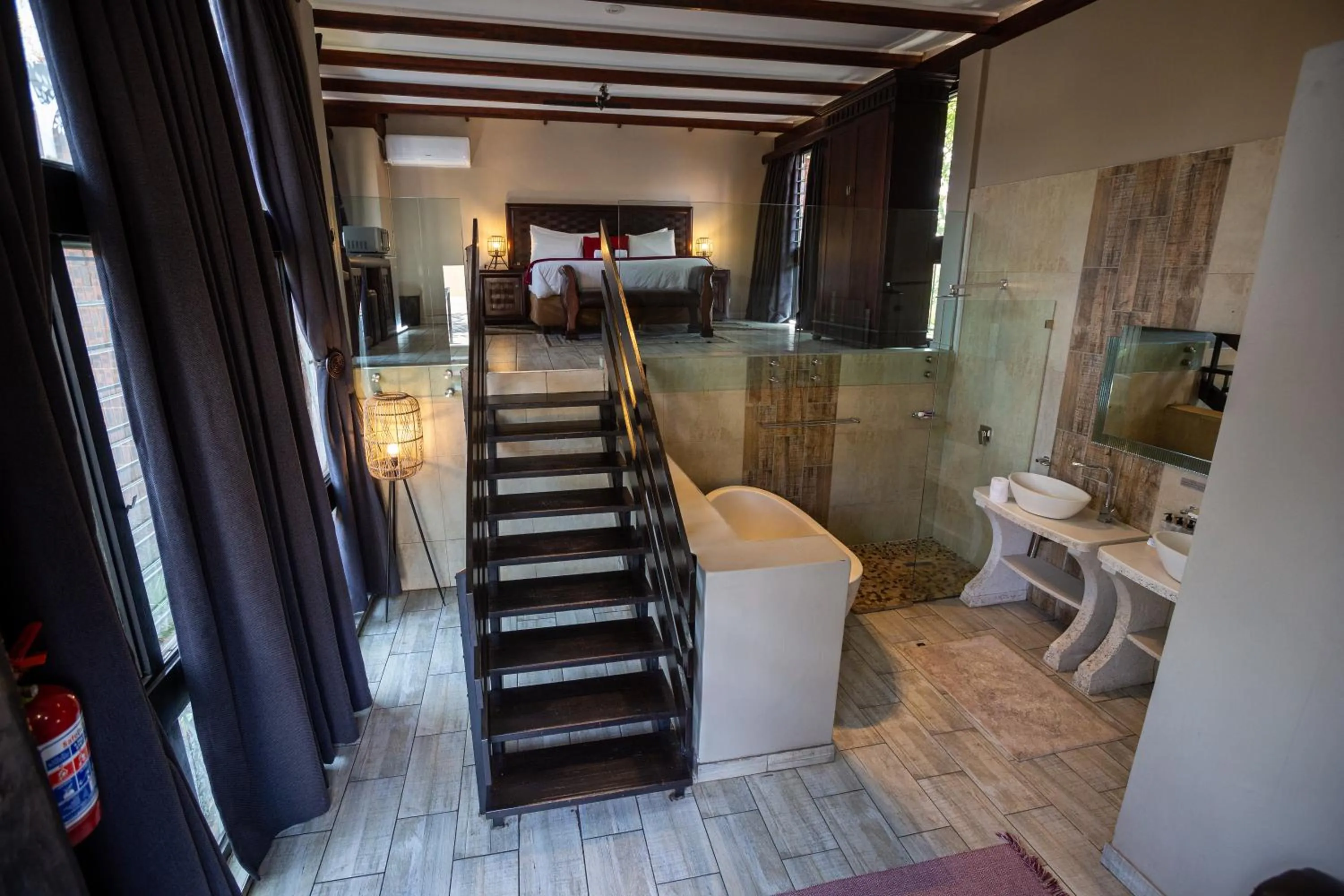 Bedroom in Waterfalls Boutique Hotel