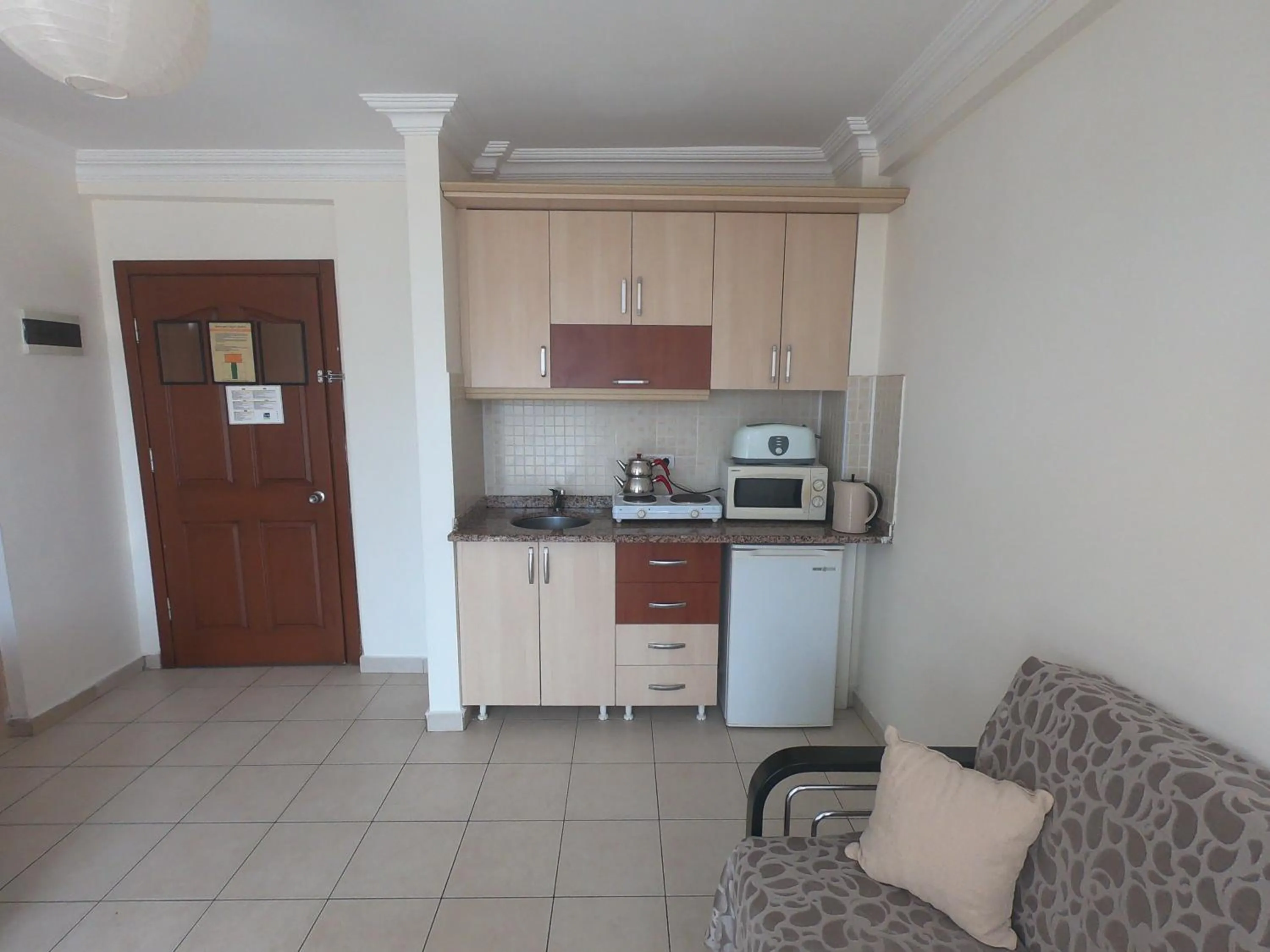 Kitchen or kitchenette in Irem Garden Hotel & Apartments