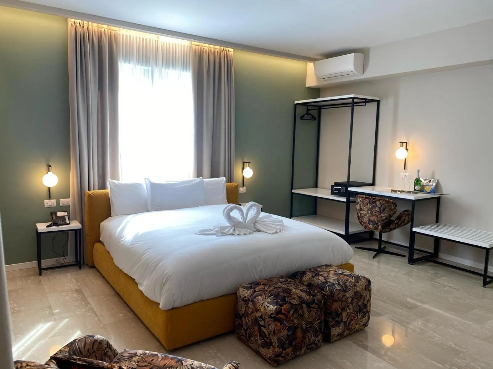 Bed in Oasi Village Hotel