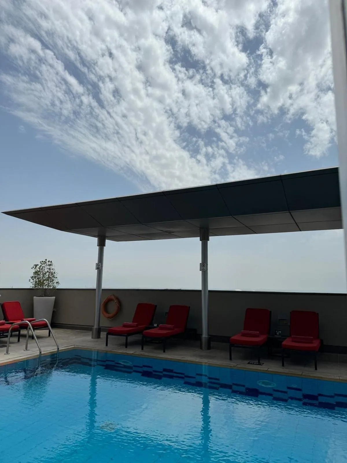 Swimming pool in Centro Al Manhal by Rotana