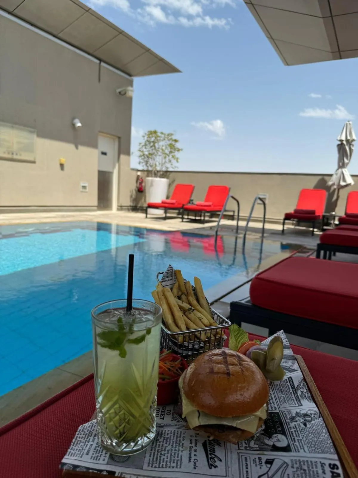 Swimming pool in Centro Al Manhal by Rotana