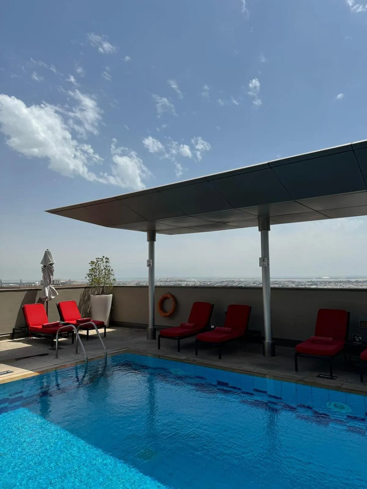 Swimming pool in Centro Al Manhal by Rotana