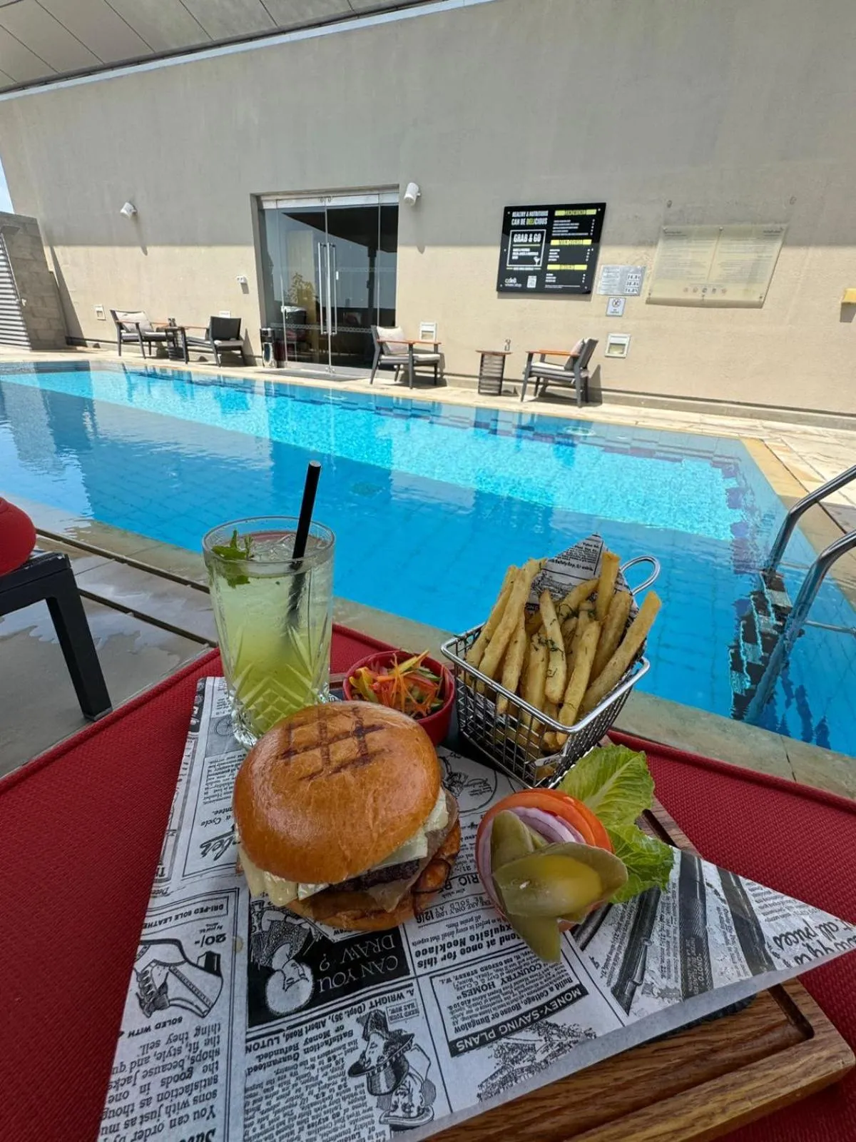 Swimming pool in Centro Al Manhal by Rotana