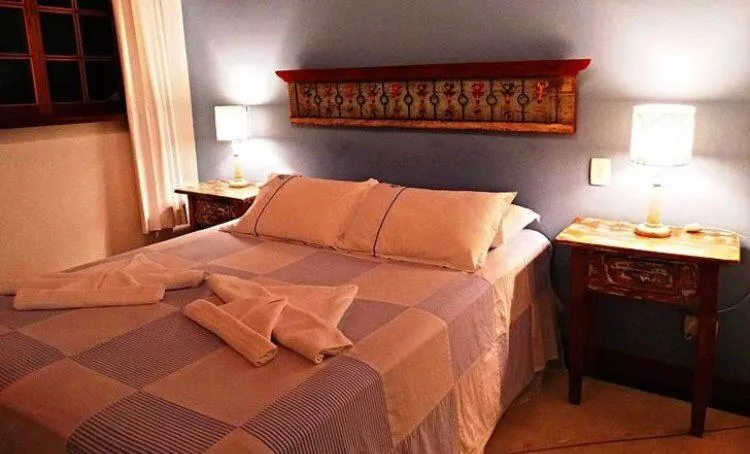 Bed in Recanto das Andorinhas Studios