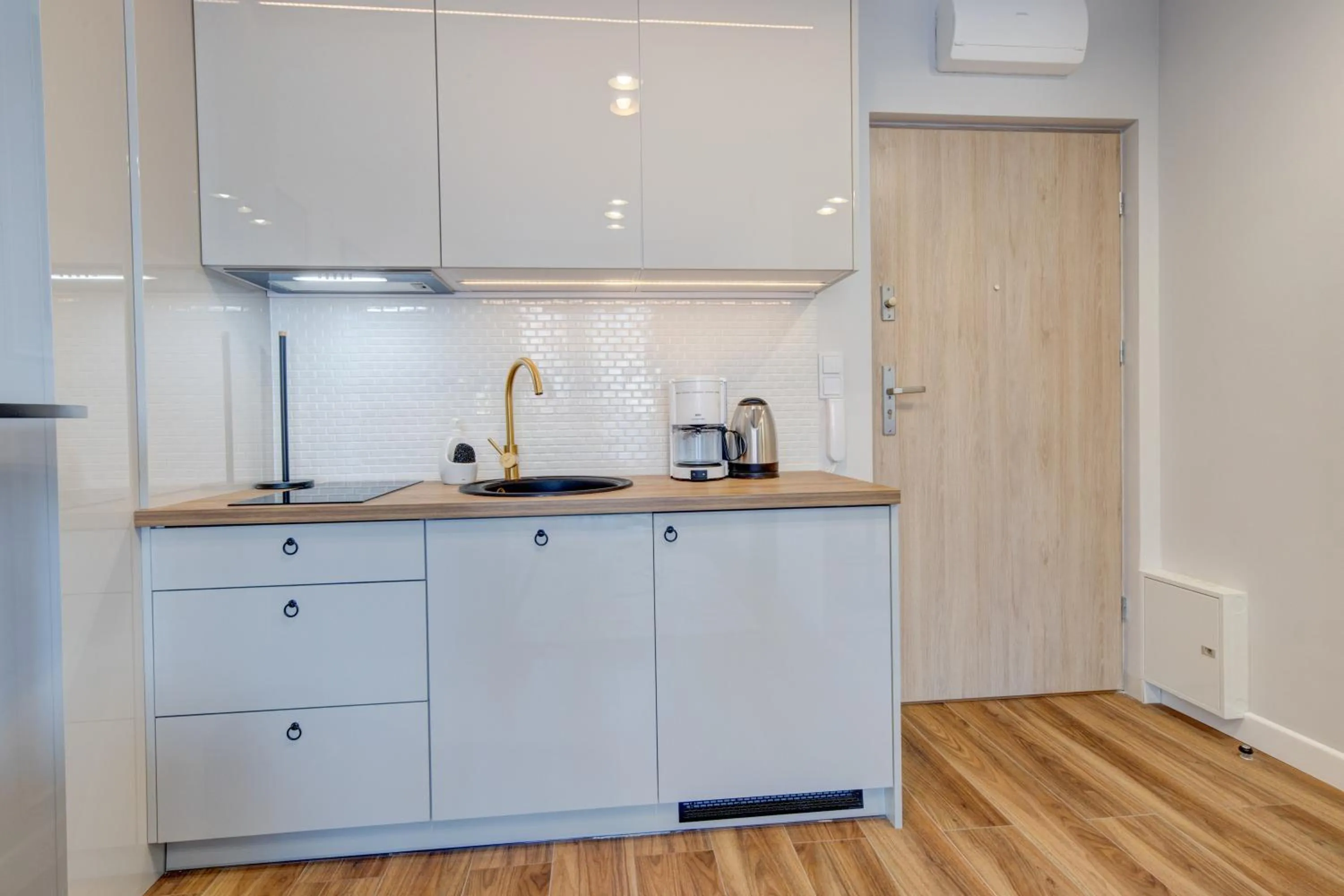 Kitchen or kitchenette in Apartamenty Rondo