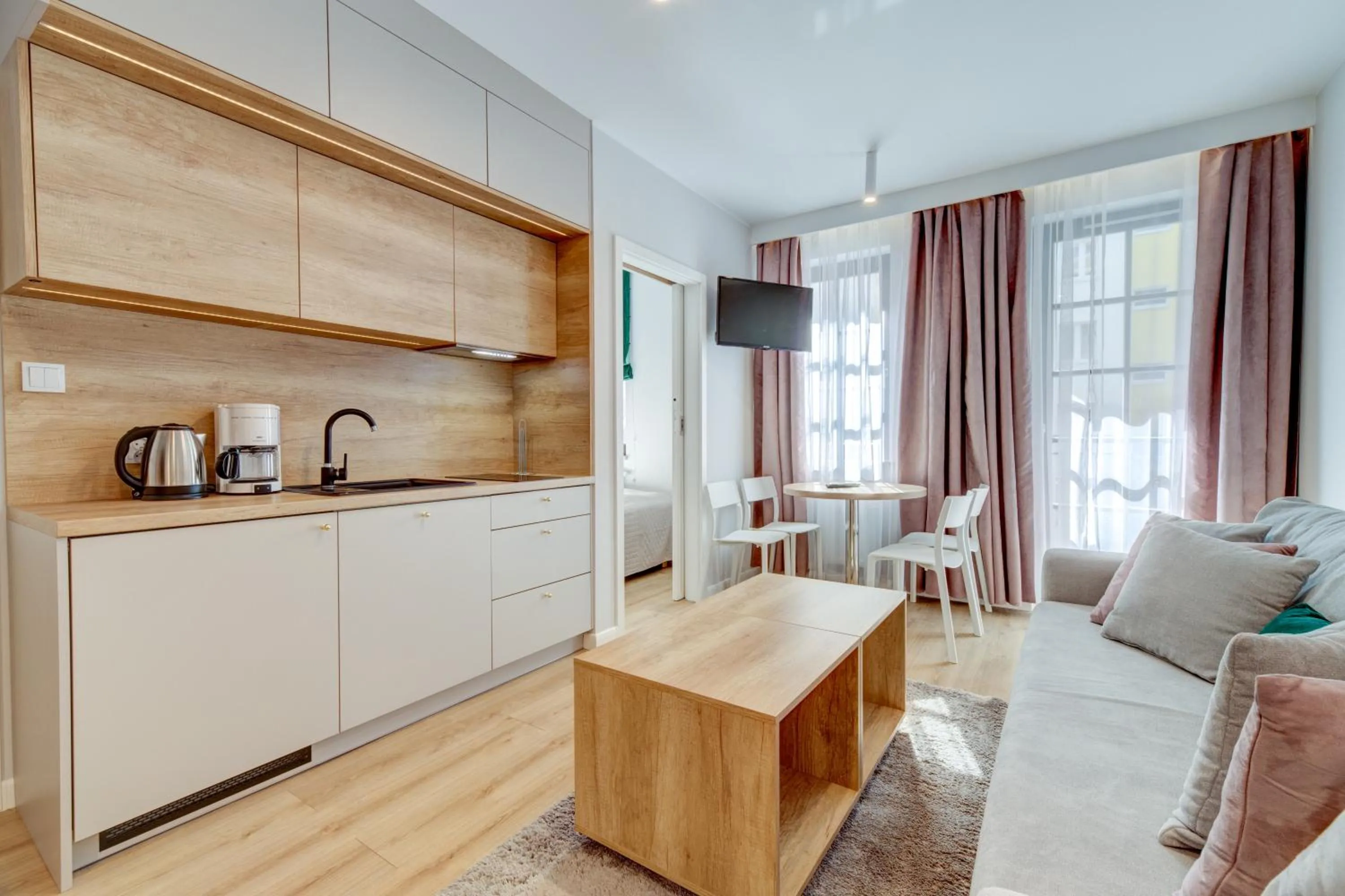 Kitchen or kitchenette in Apartamenty Rondo