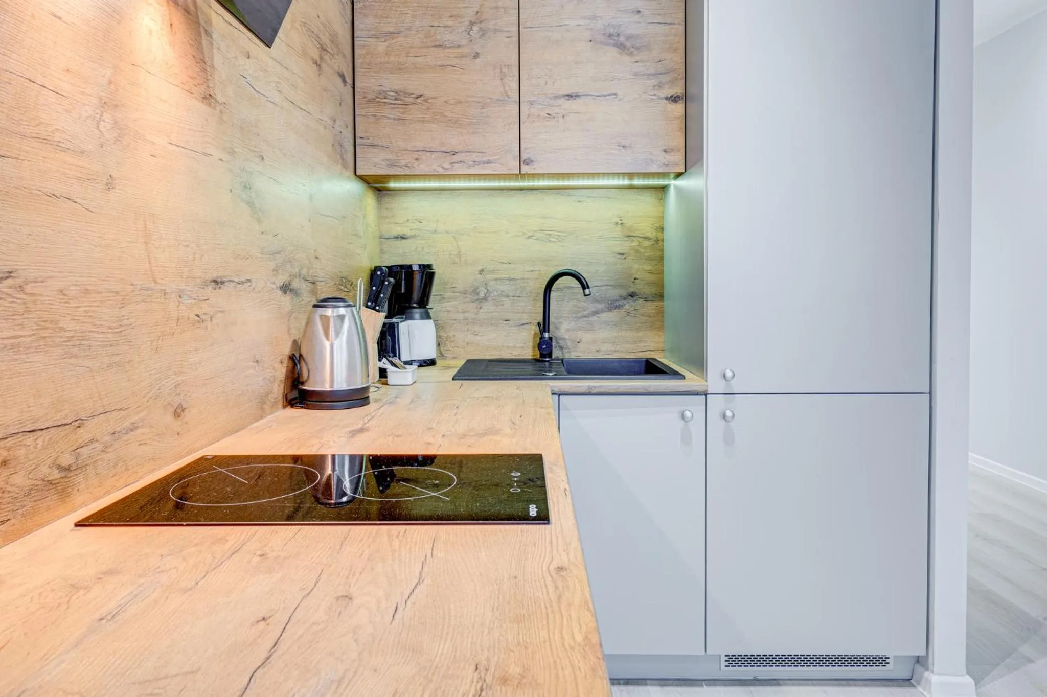 Kitchen or kitchenette in Apartamenty Rondo