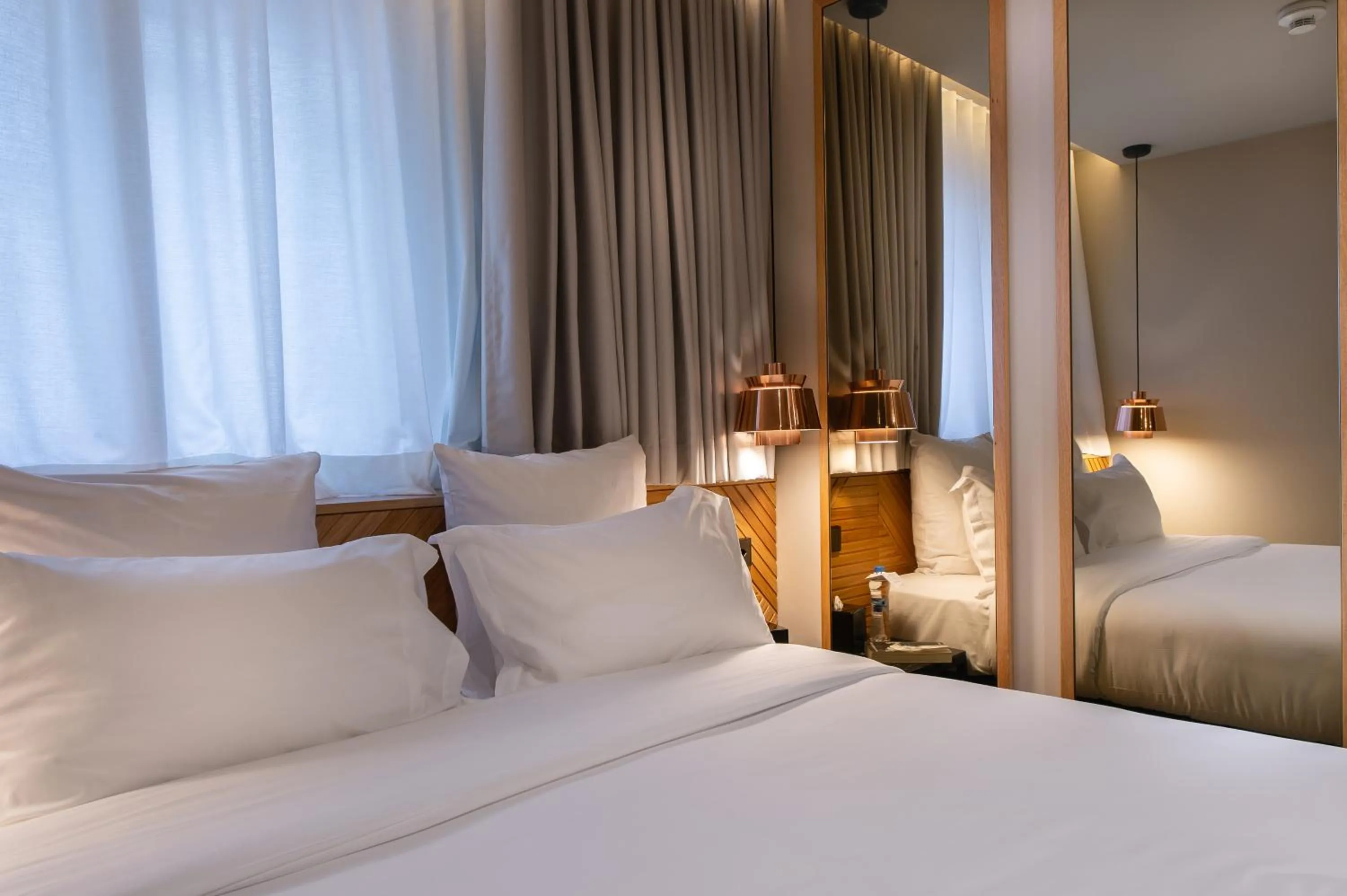 Bed in 9Hotel Paquis