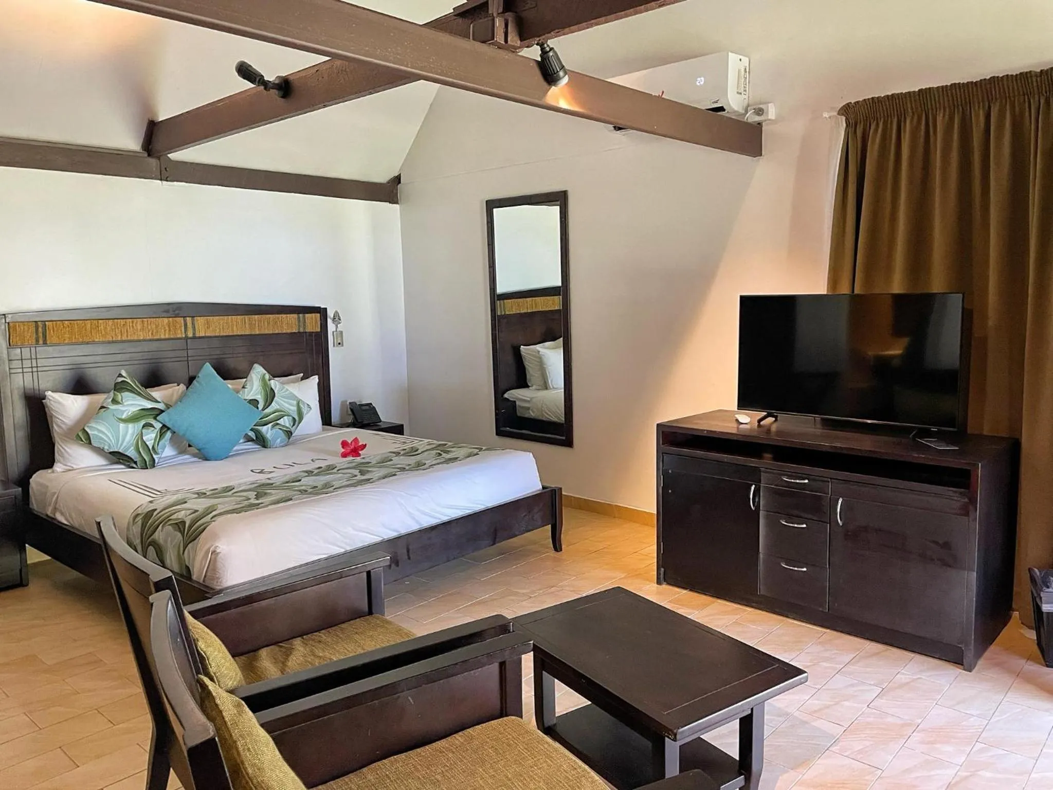 Bed in Tambua Sands Beach Resort