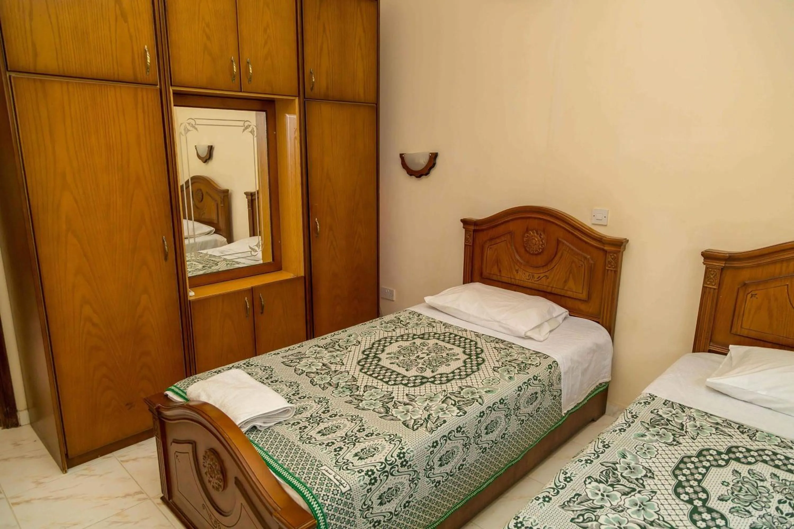 Bed in Chrysanthos Boutique Apartments