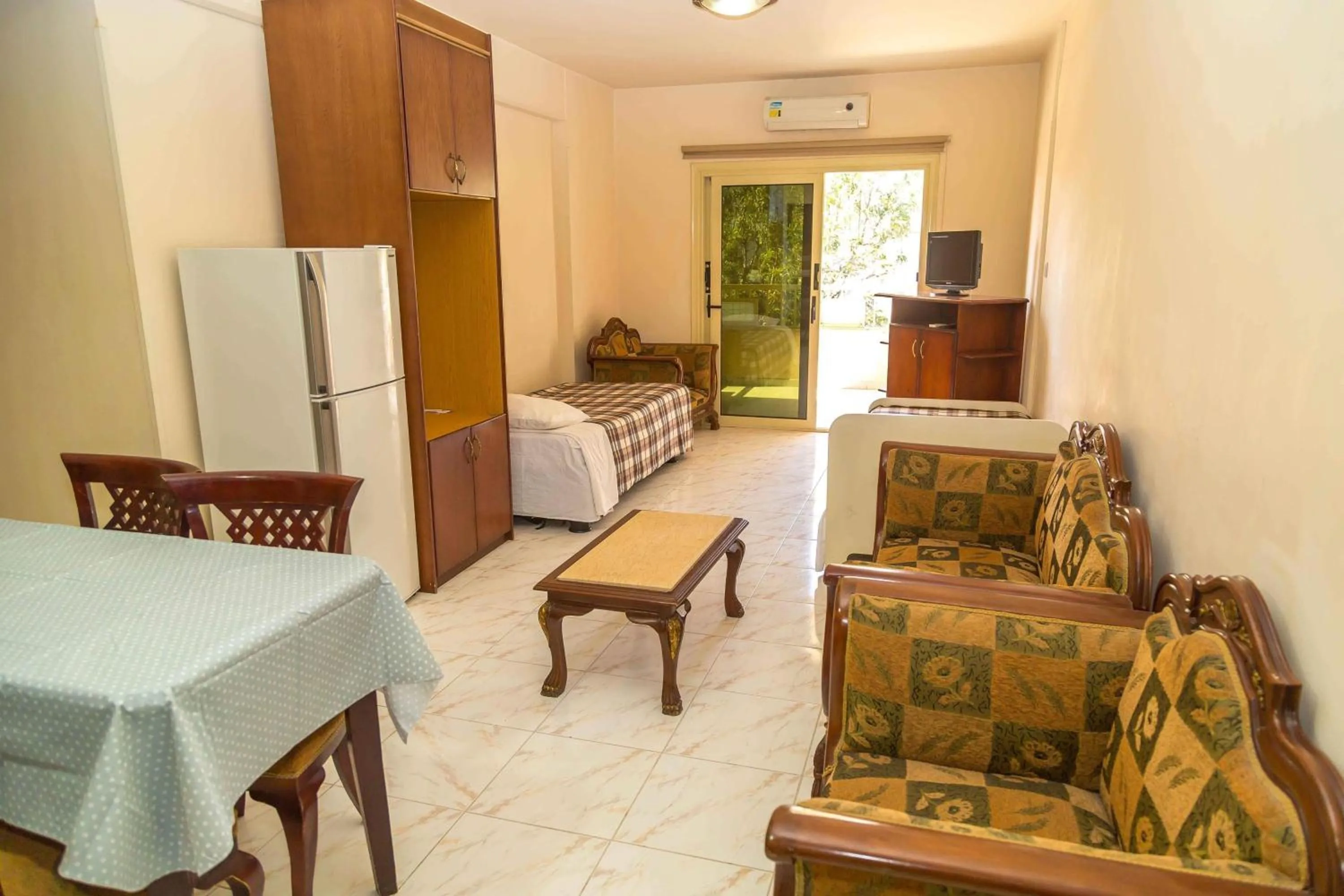 Bed in Chrysanthos Boutique Apartments