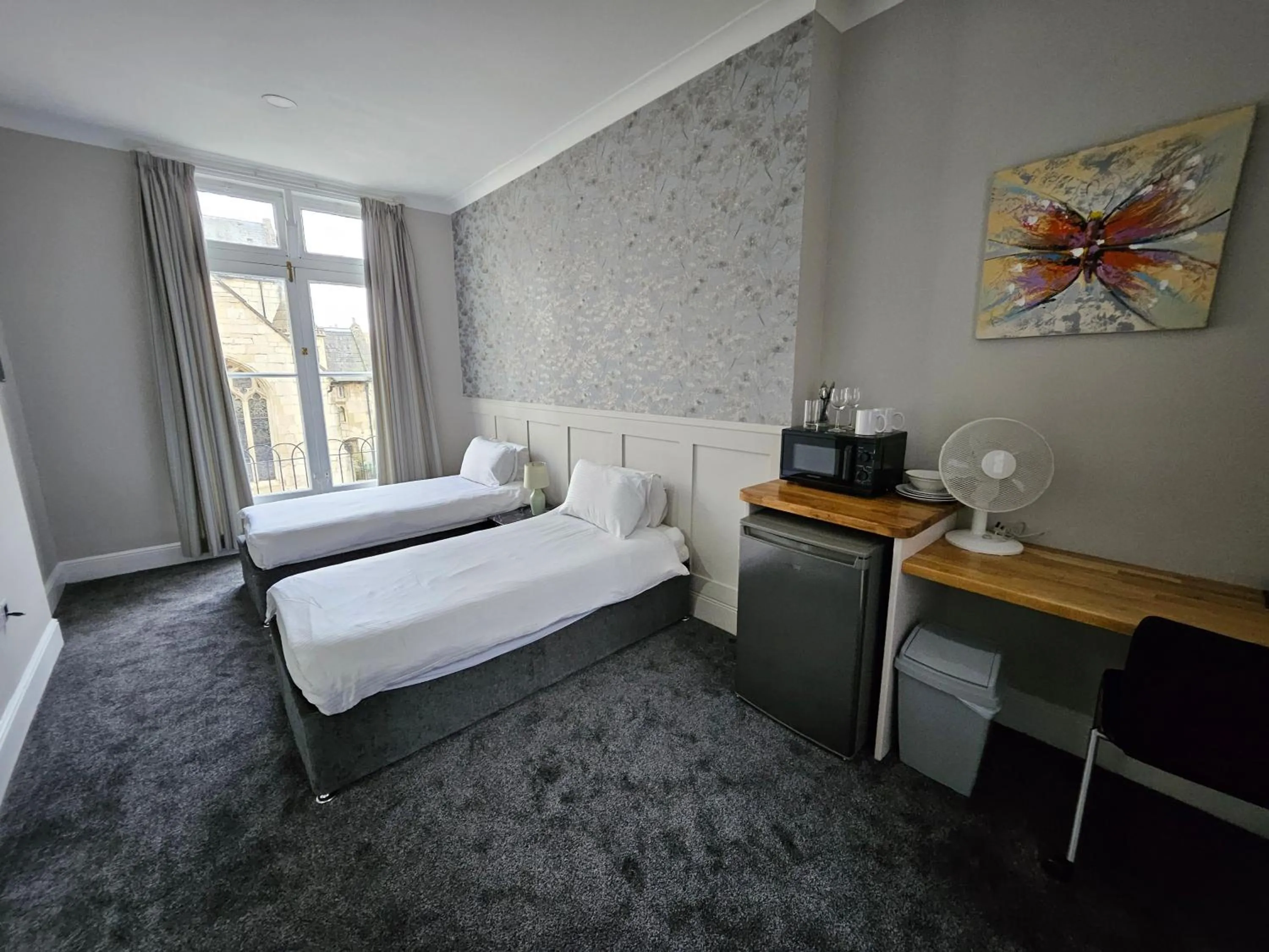 Bed in New County Hotel & Serviced Apartments by RoomsBooked