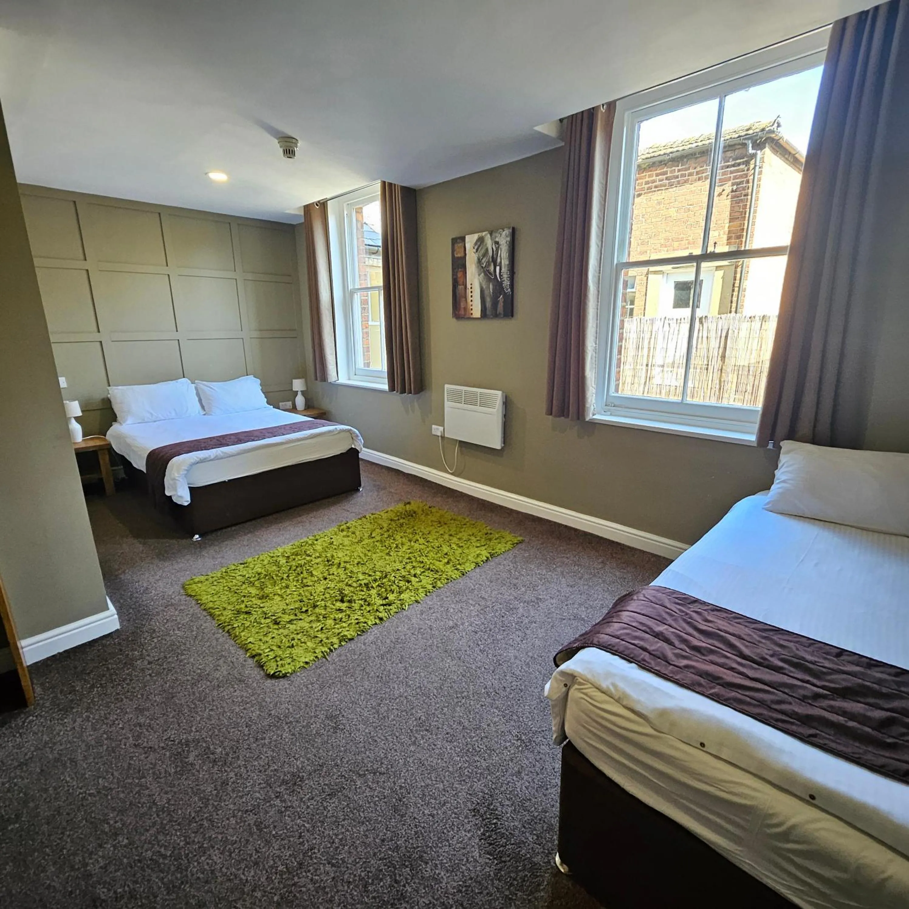 Bed in New County Hotel & Serviced Apartments by RoomsBooked