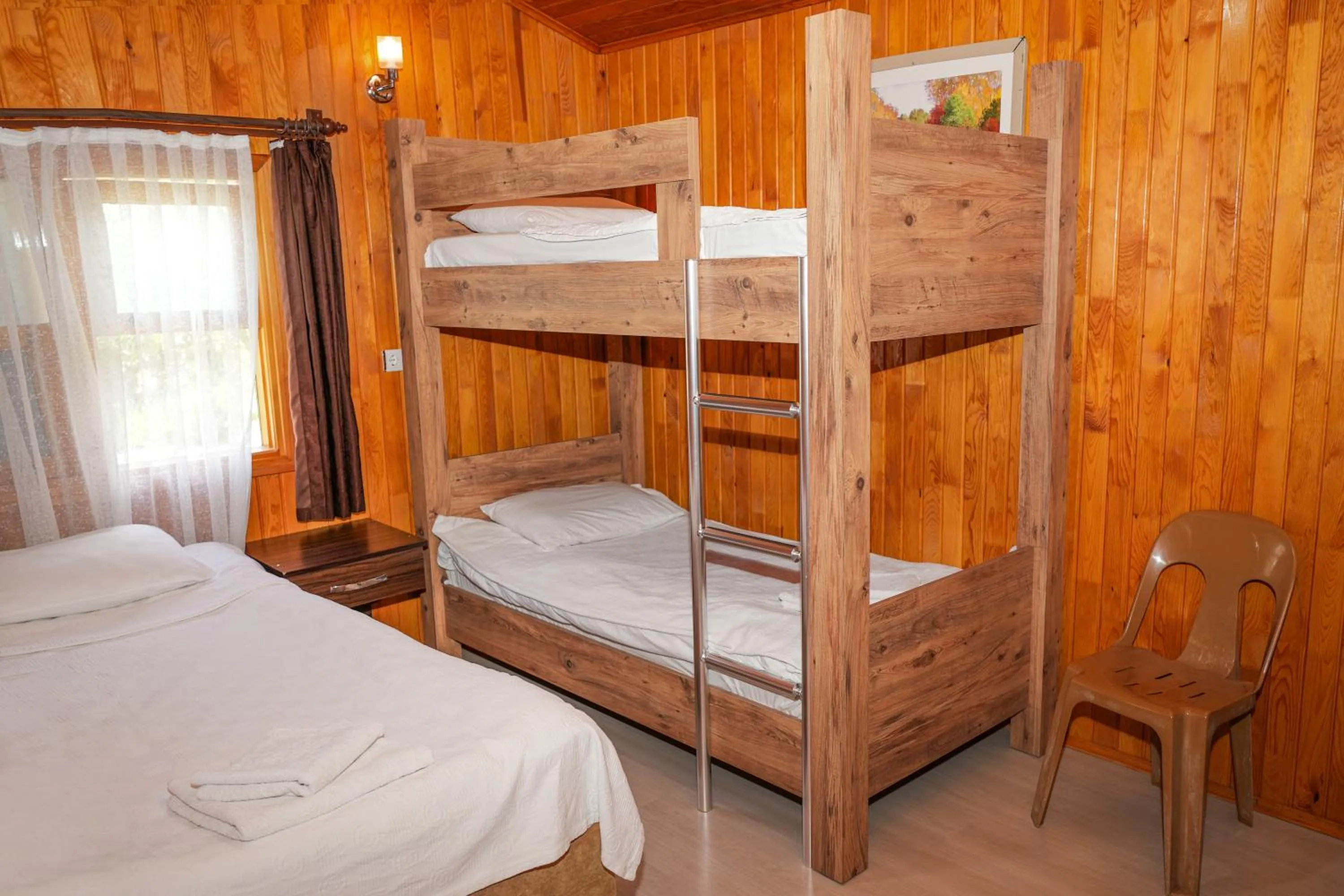 Bed in Cirali Zakkum Bungalow