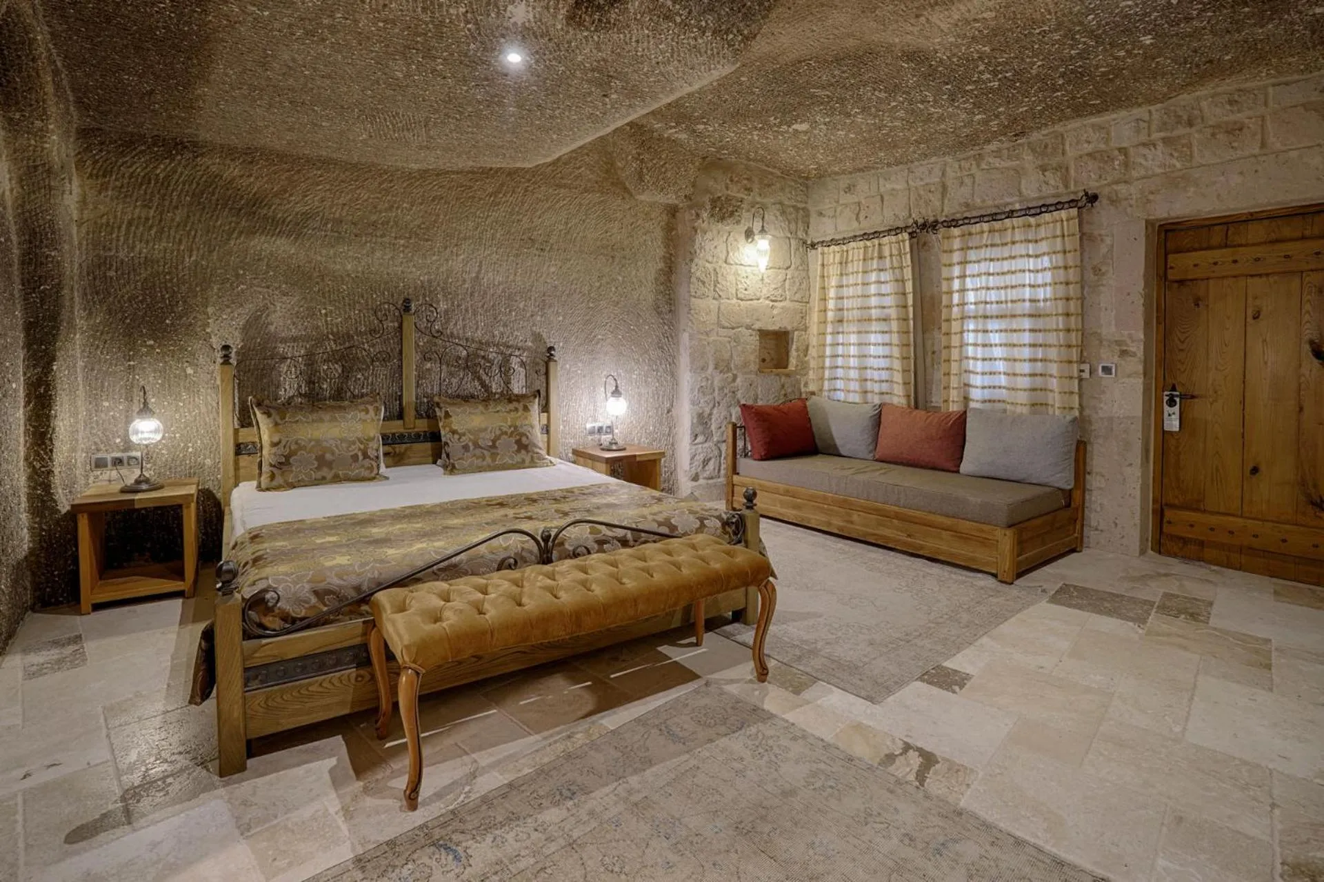 Bed in Hera Cave Suites