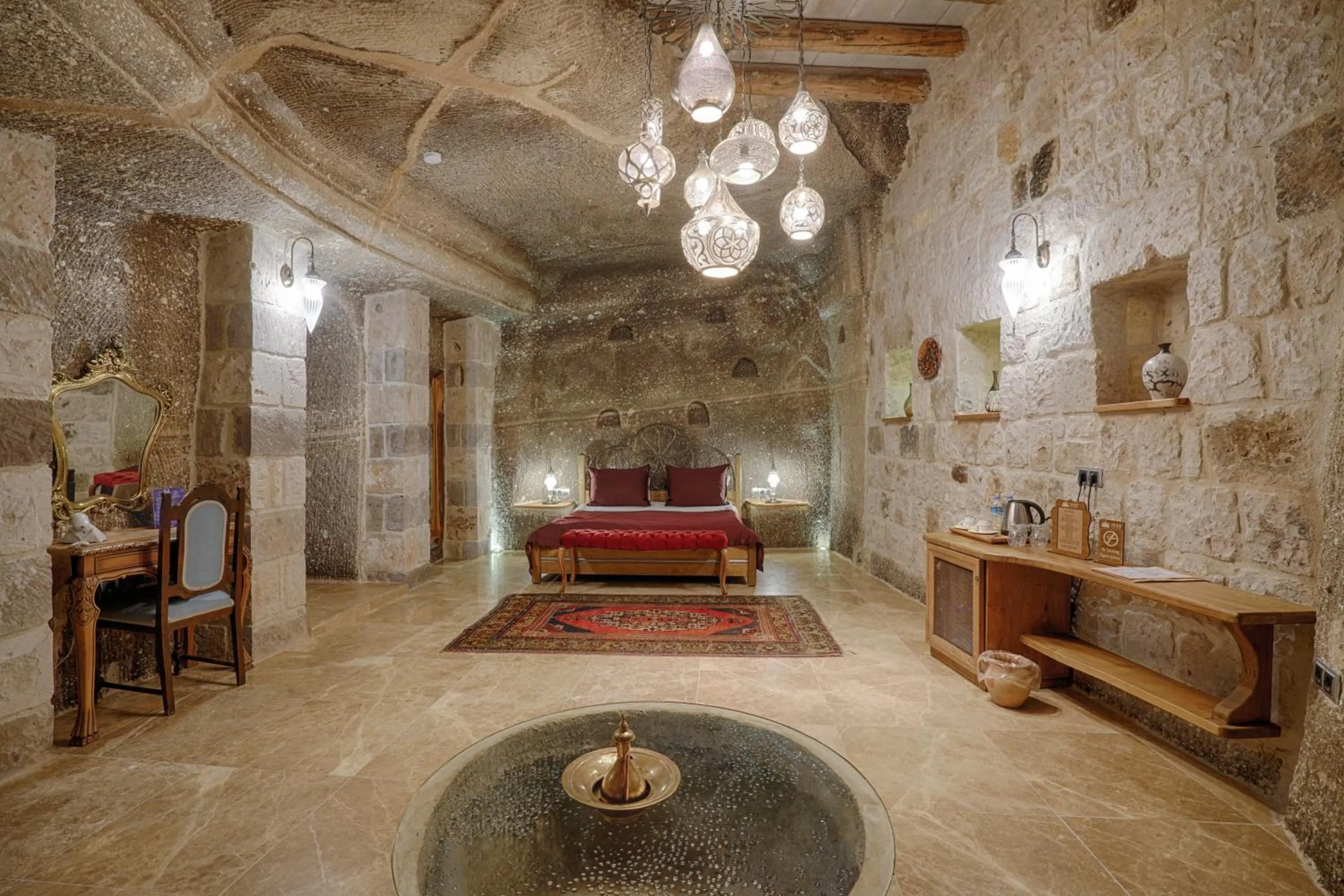 Bed in Hera Cave Suites