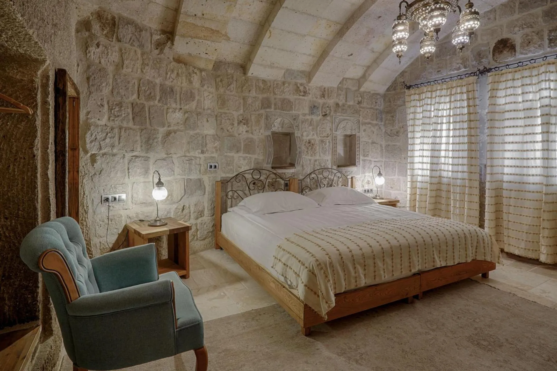 Bed in Hera Cave Suites