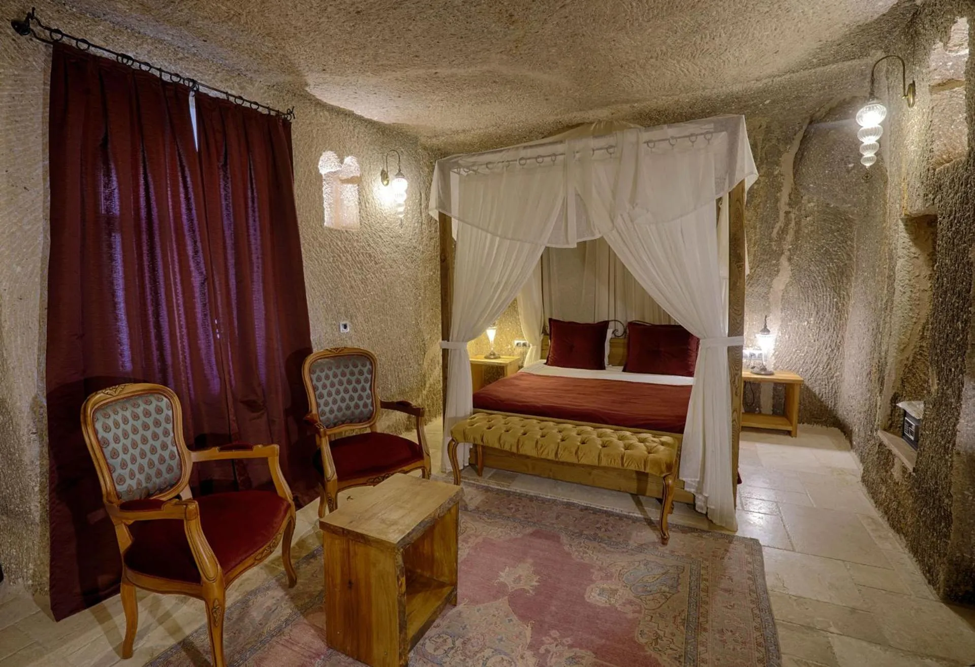 Bed in Hera Cave Suites